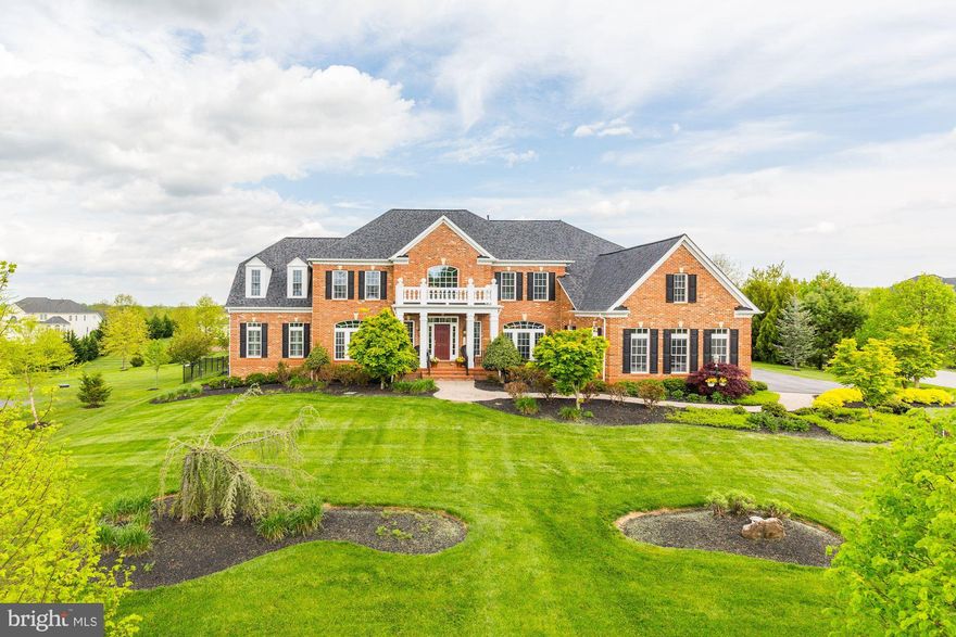 Customized luxury, stunning architecture, showcasing classic and modern design and unparalleled craftsmanship are on display in this one of a kind estate in Clarksville's highly desirable and much sought after Macbeth Farm community. Outside is breathtakingly spectacular. Inside you will find the most intricate and lavish details.   * 6 Bedrooms * 6 Full Baths * Side Sunroom * Breakfast Room *. Expansive Professional Kitchen * Custom Window Treatments * Dance Floor * Custom Bar * Home Theatre * Temperature Controlled Wine Cellar * Cedar Closet * Coffered Ceiling * Palladian Window * Main & Upper laundry * Pavilion * Manicured Lawns