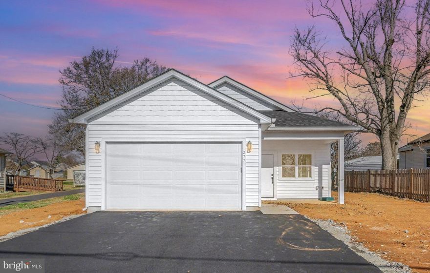 This stunning new construction home offers modern living with a classic ranch design. Just completed this detached residence features 1,632 sq. ft. of excellent condition living space, including 3 spacious bedrooms and 2 full bathrooms. The open layout is enhanced by beautiful hardwood and carpet flooring throughout. The kitchen is a chef's dream, equipped with stainless steel appliances, including a built-in microwave, dishwasher, electric oven/range, and refrigerator. Enjoy the convenience of an attached garage with space for two vehicles, complemented by a paved driveway. Set on a generous 0.32-acre lot, the property boasts a cleared and level yard, perfect for outdoor activities or future landscaping projects. This home combines modern amenities with a functional layout, making it an ideal choice for those seeking comfort and convenience in a vibrant community with no HOA! Don't miss the opportunity to make this exceptional property your own!