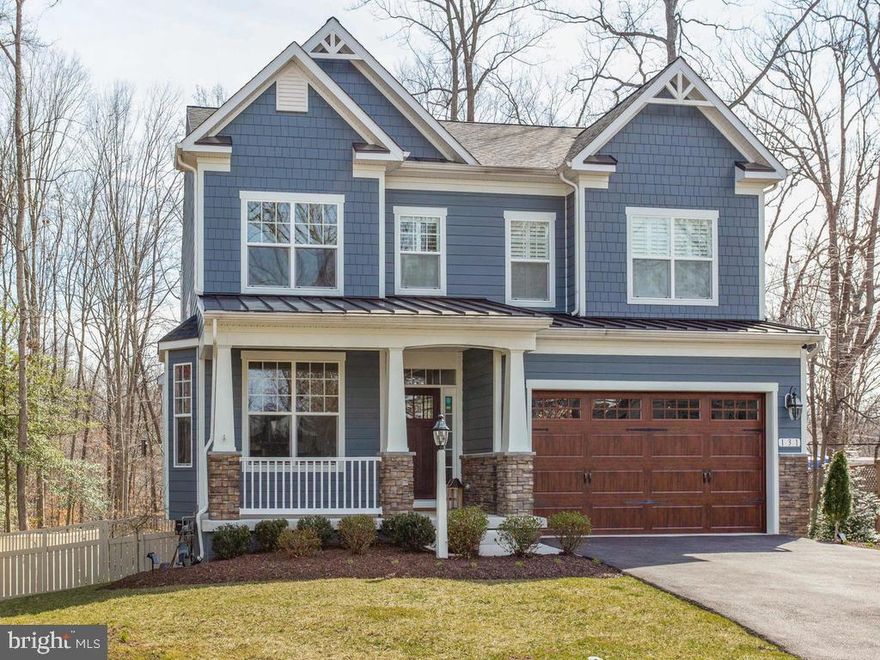 Wonderful opportunity to own this quality built home in a quaint community located in the heart of Annapolis!  Situated at the end of the community on a cul-de-sac like setting, which also backs to forest conservation giving this home incredible privacy!  This better than new home has endless features to include 9' ceilings on all levels, hardwood flooring throughout the main level, crown moldings, gorgeous kitchen with large center island/breakfast bar, 42" cabinets, granite counter tops, stainless steel appliances and spacious pantry!  Light filled family room off kitchen with beautiful stone gas fireplace. First floor also features a separate dining room!  Kitchen walks out to an absolute perfect screened in porch with a built-in Hotspring salt water spa overlooking your private back yard. Upper level features an owner's suite with two walk-in closets, a beautiful spa like bathroom with double sinks, separate shower with frameless glass door and separate soaking tub! Additional three bedrooms are very spacious!  Fully finished  walk-out basement is perfect for entertaining with a large finished rec room/game room, custom built-in butler's wet bar with wine storage, extra bonus room/office/work-out room and full bath! Other incredible features in this home include custom plantation shutters, heated and cooled garage, nest smart thermostat, smart Haiku fans, surround sound in living room and basement, irrigation system and so much more... All appliances are energy star!  HOA covers grass cutting! Minutes to downtown, shopping, incredible dining, bars, fitness centers and so much more.  Easy commute to D.C. and Baltimore!  Chesapeake Bay living at its best!