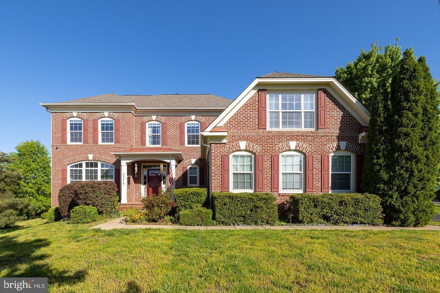 This elegant three-level colonial sits on a tree-lined street in the highly desirable Triangle, just minutes from Triangle Elementary, Graham Park Middle School, and Potomac High School. Nestled near Marine Corps Base Quantico, the town of Triangle is home to the United States Marine Corps heritage and culture. This location has easy access to both I-95 and Rt-1. It is an easy commute to Quantico, Fort Belvoir, the town of Occoquan, and Washington D.C. featuring Quantico Creek, the Potomac River, and the Occoquan River. 

A private entrance, concrete pathway, and thoughtfully landscaped grounds invite you into the front yard. Upon entrance, you are warmly greeted by upgraded hardwood floors, crown modeling, recessed lights, and oversized vinyl windows on the main level. Over 3,100 finished square feet boasting a gourmet kitchen with an island, granite countertops, ample cabinetry, and plenty of storage space to include a butler’s pantry. The formal dining connects to the formal living room, and you will also find the family room on this level with upgraded carpets and access to the backyard. Enjoy lounging and grilling on the rear deck during milder months! A half bathroom and a main-level laundry finish off this floor. The upper level includes an oversized master’s suite with an en-suite bathroom and a large walk-in closet. A second bedroom with its own private bathroom as well as an additional two fairly-sized bedrooms and a full bathroom is also present on the upper level. Lots of potential for more space and storage with the unfinished basement with walkup access to the backyard and deck.