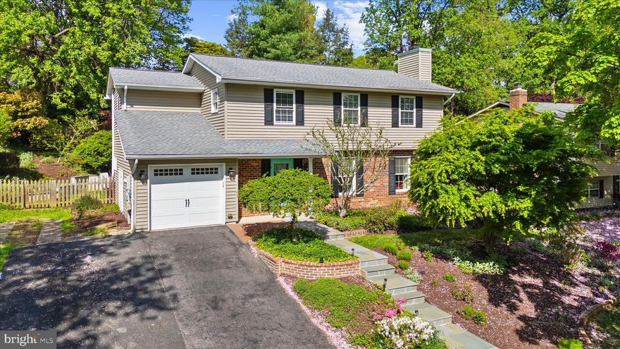 The work is done here. Not something all homes can boast. This colonial runs larger than most similar Atlantis homes with family room adjacent to the kitchen for nearby homework or play. Brand new laminate flooring throughout the home, every room, top to bottom. Living room with wood burning fireplace and built-ins, stylish white kitchen with Jenn-Air downdraft range and peninsula. Primary bedroom with built-ins and en-suite bath. All bedrooms spacious. All bathrooms updated. With winter water views from the upper level. 
Hard to find a better maintained home. New HVAC, two upper-level mini-splits, new water heater. Extensive landscape and hardscape. One-car garage with double-wide driveway and a side yard parking pad for a camper or boat. 
The fully fenced two tiered rear yard is its own reward. With easy access from the dining & family rooms onto the rear patio and yard.  Steps up through the retaining wall to the upper yard. Upper bricked pad ready for a screen room plus a treehouse - built to last. Or opt for a serene perch on the front porch.
Just a short block to the community pier and kayak launch. A few doors down in the other direction to the tot-lot. Five minutes to route 50, 15 minutes to Annapolis, convenient access to the Baltimore-Washington corridor.
Move in and settle. Everything else is already handled.