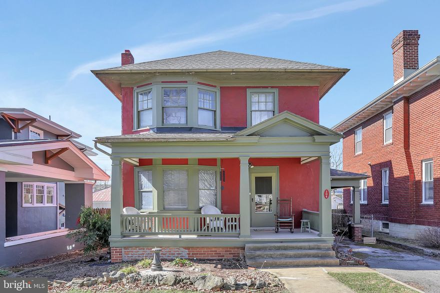 Traditional "American Foursquare" home on one of the nicest streets in town.  Presenting 104 N. Tennessee Avenue.  Large front porch welcomes you to the three bedrooms, one and half bath home with hardwood floors throughout.  You enter through the beveled glass front door into the spacious foyer where you glimpse the bygone era of this lovely, well-made home.  The grand staircase greets you while the inviting living room, dining room, and kitchen beckon you to explore the gracious main level.  This home features three levels of bump out first visible in the large living room equipped with a cozy pellet stove.  There is a pocket door between the living and dining room. Dining room has crown molding and built-in display/storage cabinet.  The kitchen is nicely outfitted and has a door to the back porch plus access to the finished basement.  Between the foyer and kitchen is the butler’s pantry.  Upstairs are three large bedrooms. The third does not have a closet but does have staircase leading to the attic… a truly special place that just oozes potential if finished could be anything your imagination dreams of.  Main bedroom has access to the balcony or "sleeping porch" as it is covered and fully screened.  The home's main bathroom is on this level and features glass block accent wall and ceramic tiles.  Basement is a cozy finished recreation room with Franklin Wood Stove.  The separate laundry room and half bath are on this level plus a storage room.  Out the back you arrive on the back porch where the back yard is fully fenced, has easy alley access, patio, koi pond, and a shed with electric that matches the house color scheme.  Your parking is off street and includes a covered parking spot.  Ample street parking can also be found, home is close to downtown but easy access to I81.