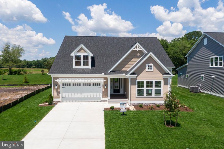 Immediate Delivery! This stunning ROANOKE by Foxlane Homes at EAST GATE will be ready to call home this summer . The Roanoke with 2,550 sqft is the best in 1 level living. This well thought out open concept floorplan with 9ft ceilings, offers a generous size family room with a fireplace, large Gourmet kitchen, designated dining space, that opens to a rear deck, powder room, study, 2 guest bedrooms with a shared bathroom and a private primary suite; all of which are appointed with top tier finishes. You will love the luxurious feel this home encompasses, from the brass finish on fixtures, upgraded lighting and neutral two tone Gourmet kitchen  with quartz countertops and luxury vinyl plank flooring that runs throughout the main living areas and primary bedroom, with upgraded carpeting in bedrooms 2 & 3. The 3 car garage offers ample room for parking or utilizing some space for storage. Sales office is open daily to tour this home.