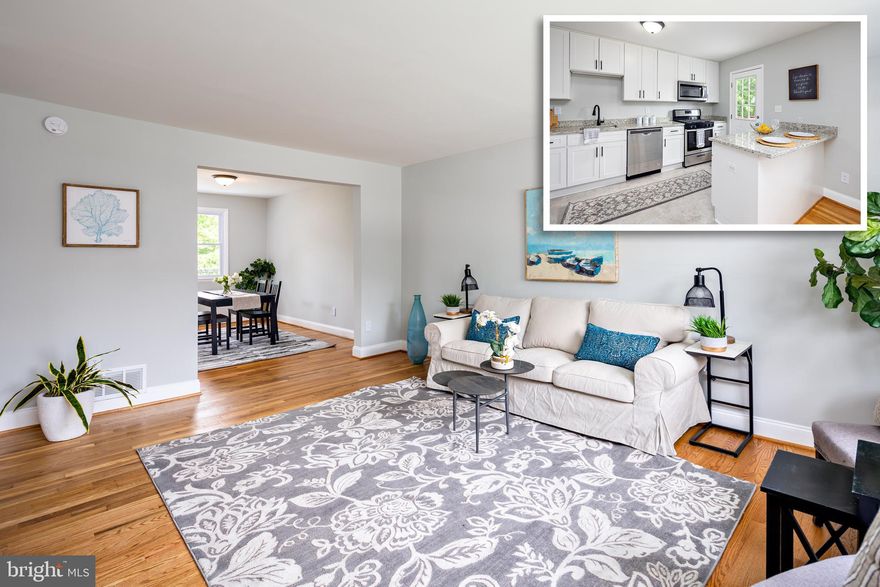 PICTURE PERFECT RENOVATION! Enter into a bright and airy living area with beautifully refinished hardwood floors that seamlessly flow through the formal dining area.  The kitchen has been fully remodeled and features custom white shaker cabinetry, granite countertops and stainless steel appliances.  Upstairs you will find three generously sized bedrooms and a full renovated bathroom with custom ceramic tile.  The basement has been partially finished with an additional large living area and a conveniently located half bathroom.  Off of the kitchen is a large and very private deck perfect for relaxing.  This home features so many updates and is ready for you to move right in.  All work has been permitted and performed by licensed professionals.  House is vacant and easy to show so schedule your showing today!