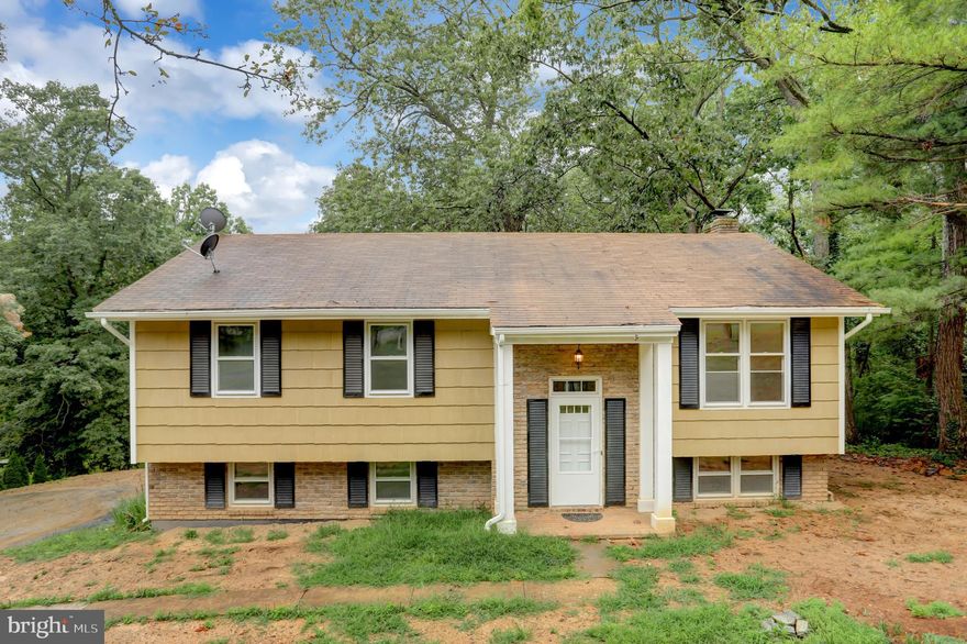 ***Back on the market pending release- buyer's financing fell through** Looking for a private setting South of Westminster yet still convenient to everything? This 4 BR 2.5 bath Split style home features new carpet and paint and flooring kitchen & foyer flooring.  The lower level features a large open family room w/ wood stove, half bath, separate laundry room and a 4th BR/den. Exit the lower level to the private rear yard backing to woods.  Long blacktop driveway with plenty of parking and a turnaround too.  This property is priced to allow for future improvements mainly cosmetic!