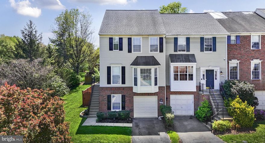 Wow! This home is everything you've been looking for and more. There is nothing to do but move in and relax. The current owners have meticulously updated and maintained this home. Welcome to this very spacious end-unit townhouse, offering the perfect combination of comfort, modern style, and quiet privacy. The 4th largest home in this community of 209 homes, this Van Metre built Chadwicke model offers 2424 Sq. Ft. of living space and features three fully finished levels, four bedrooms, three and a half baths, an attached garage, and a tranquil setting. This home truly has it all. And it's super convenient to all that nearby One Loudoun has to offer.

Step inside to a bright and inviting interior showcasing newly refinished hardwood floors throughout the main level, and a smartly designed open floor plan. The main level boasts a spacious living room and dining area, flowing seamlessly into a bright and airy updated eat-in kitchen with quartz countertops, stainless steel appliances, and beautiful and abundant cabinetry—a perfect space for both everyday living and entertaining. Just off the kitchen, the breakfast area provides direct access to the deck, perfect for morning coffee or outdoor dining.

Upstairs, you'll really be impressed by the luxurious primary suite with a walk-in closet and spacious en suite bathroom featuring double vanities, as well as beautiful custom tile, flooring and fixtures. There are also two additional generously sized bedrooms with tasteful decorator touches. The bedroom level also features a very spacious hallway which further expresses the very open and airy feeling of the home.

The finished lower level offers incredible flexibility with a family room featuring a cozy gas fireplace, a fourth legal bedroom, and a fully updated bathroom—ideal for guests, an in-law suite, or a home office. Step out of the walkout basement to the private, fully fenced backyard and enjoy the tranquility from your stamped and stained concrete patio, perfect for relaxing or hosting gatherings.

Located just minutes from restaurants (too many to name) including those in One Loudoun, shopping and entertainment, and Washington Dulles Airport, this home is also a commuter’s dream with easy access to major roadways and metro rail.

Additional home features include: Washer/dryer (2025), Microwave (2025), fresh paint (2025), carpet in bedrooms (2023), french doors in kitchen & front door (2022), Backyard patio (2022), Garage door (2021), New roof with 40 yr. architectural shingles (2015)

Don't miss this rare opportunity to own a beautifully maintained and thoughtfully upgraded home in a desirable setting!