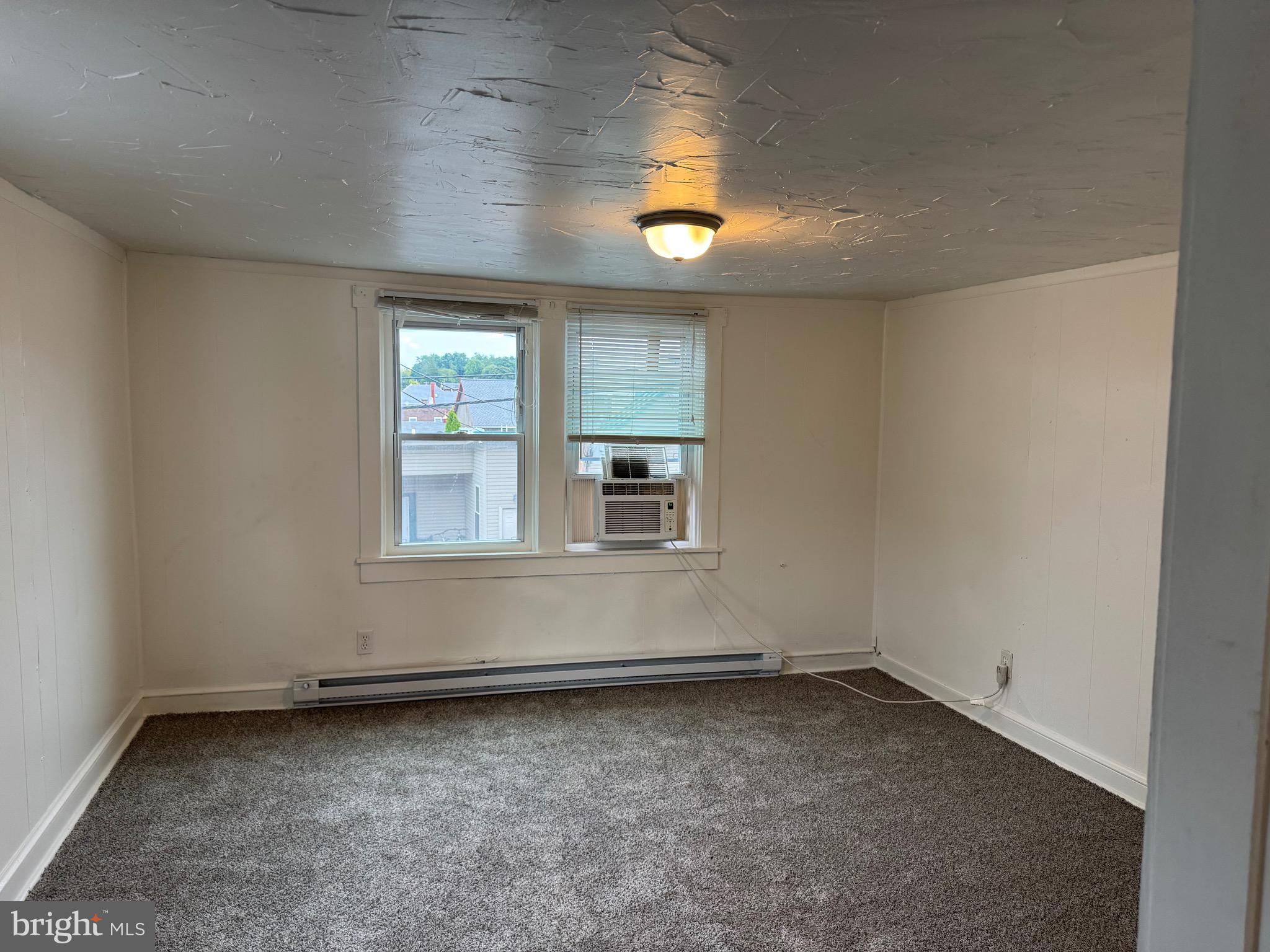 For rent is a 2 bedroom, 1 bathroom in Quarryville Boro. Apartment has new paint and carpet throughout. Apartment will be getting new lights in the rooms. Off street parking for 2 vehicles. Apartment is electric baseboard heat and window units for A/C. Trash is included. Tenant pays W/S. No Smoking, No Pets. $50 nonrefundable application fee required per applicant and if selected $50 admin fee. 615 Min. Credit Score