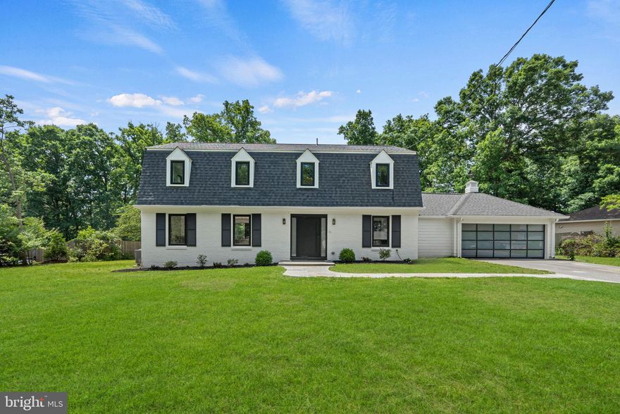 New on Market! This home has been expanded and completely remodeled back to the studs including - new plumbing, electrical, flooring, drywall, all new baths, new kitchen and newly finished lower level - this one is not to be missed! Nestled on a quiet cul-de-sac in the sought after Willowbrook neighborhood close to Churchill HS, you’ll love this open floor plan that seamlessly connects the living spaces, highlighted by a gourmet kitchen with oversized appliances, perfect for the culinary enthusiast. Main level bedroom or study features a full bathroom and caters to convenience and accessibility. Upstairs, the primary suite awaits, complete with a luxury en-suite bathroom featuring a soothing soaking tub ensuring a tranquil retreat. Three additional bedrooms, two additional bathrooms (yes, three baths up!) along with a laundry rm complete the upper level. Entertain or relax in the fully finished lower level, where a recreational room with a bar awaits. The lower level also includes a full bathroom and bonus room, enhancing the entertainment possibilities. Extend your living outdoors onto the custom deck that spans the entire back of the home, providing an idyllic setting for gatherings or peaceful evenings. Completing this impeccable property  on almost 1/2 acre of land is a spacious 2 car garage. Its prime location less than a half-mile from Churchill High School and proximity to shopping, dining, grocery, and commuter roads makes this an unbeatable opportunity to own a piece of Potomac luxury. Don't miss out on calling 8610 Camille Drive your new home!