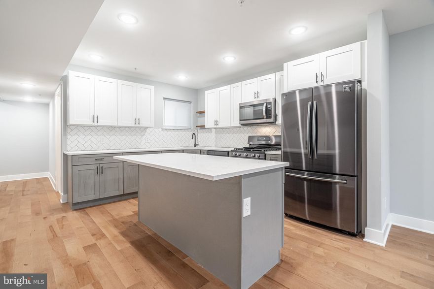 Welcome to 1501 N Bailey St, a large 4-unit, 5,500+ SQFT apartment building located in one of Philadelphia's hottest neighborhoods -- Brewerytown, steps away from a beautiful park and Girard Ave. This Quadplex is not only in a convenient location, where property values are appreciating; but it's also located in the Qualified opportunity zone (QOZ), making this a very secure investment.  The seller spared no expense, as all units offer stunning finishes, an elegant fireplace, high-efficiency mechanicals, recessed lighting, gorgeous Maple hardwood flooring throughout, and large private outdoor spaces in select units. The living rooms have very high 10ft+ ceiling heights, modern kitchens with black stainless steel appliances, quartz countertops, and two-toned shaker cabinetry for a modern feel. Unit A is a 3 bedroom, 2.5 bath apartment with access to a back patio space! Unit B is a 2 bedroom, 2.5 bath with a gorgeous kitchen and accompanying island. Units C and D are both 2 bedrooms, 2.5 baths with access to individual rooftop decks, perfect for entertaining guests! Street parking is plentiful on this block, and the building is steps away from shopping, doggy daycares, other new construction homes, and much more!   The proximity to Fairmount Park's greenery and great access to public transportation make this a desirable location for just about anyone! This limited investment opportunity provides a strong 7%+ cap rate on your investment, with a gross operating income of over $100k! All units are on their own meter for gas and electric, and each have their own gas furnaces, water heaters, as well as washer and dryers! There is a huge development underway across the street and next door, as well as planned future developments on the same block. Currently awaiting to pull CO for anyone interested in the QOZ opportunity. For any inquiries, please contact Philly Home Advisors today!