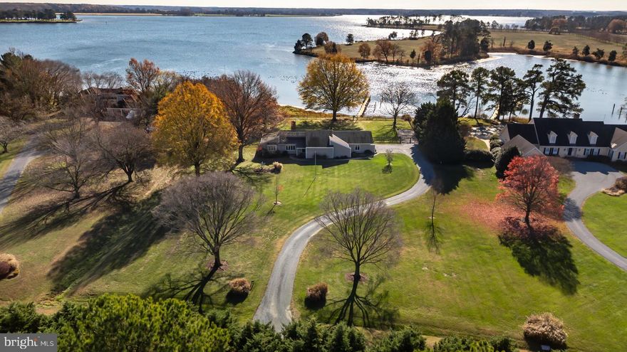 Welcome to this premier waterfront home on Maryland’s Eastern Shore, where breathtaking southern views of the Tred Avon River are just the beginning.  Set on a 2.12-acre lot with over 120 feet of prime waterfrontage, this exceptional home offers unparalleled beauty and tranquility, perfect for those seeking the ultimate in luxury living. Wake up to unobstructed views of the river each day. The expansive property boasts unusually deep water, perfect for boating and water enthusiasts. The private pier, complete with a boatlift, offers direct access to the river, making it ideal for those with a passion for sailing or simply enjoying the serene waterside. Relax and entertain in style with your very own waterside gunite pool. Whether you’re swimming laps, lounging by the pool, or enjoying evening cocktails, the river views provide a stunning backdrop for every occasion. The one-level home spans approximately 2,700 +/- square feet, and is thoughtfully designed for comfort and ease of living. With 3 bedrooms and 2.5 bathrooms, this home offers ample space for both relaxation and entertaining. The open floor plan provides seamless flow throughout the living areas, creating a welcoming atmosphere perfect for hosting friends and family. For those in need of extra storage or workspace, the oversized two-car garage includes an attached workshop – ideal for hobbies, projects, or simply keeping things organized. The home is set among beautiful, well-maintained landscaping that enhances the property’s natural beauty. The carefully designed outdoor space offers privacy and a sense of seclusion, while allowing you to enjoy the best of waterfront living. This home is not just a property; it’s a lifestyle. Whether you’re an avid boater, a lover of nature, or simply someone who appreciates the finer things in life, this stunning waterfront home offers everything you could want and more.   Experience the magic of living on the Tred Avon River in one of Talbot County’s most prestigious Estate areas.