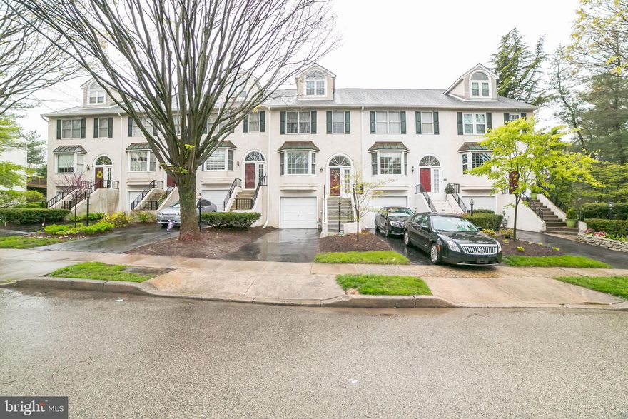 In  person showings per the Governor's Mandate are now allowed 5/19!! Welcome to this meticulously maintained town home in the desirable Mitchell Court community! A bright and inviting foyer greets you as you step into the home. To the left is a modern, updated kitchen, that features cherry cabinetry, gorgeous granite counter-tops, and GE Profile stainless-steel appliances and natural gas stove! A cozy alcove with bay window offers a lovely place for a breakfast table. The kitchen offers a pass-through window to the spacious dining area and living area, accented by Brazilian cherry hardwood floors, wood-burning fireplace and sliding door to a private deck. You will also find a powder room on this level. The second floor boasts a large master bedroom with plenty of closet space and access to a large bathroom with linen closet, separate shower and whirlpool tub. The second spacious bedroom is located just down the hall, as well as a laundry room and hall closet. The third floor offers a pretty and very spacious bedroom/office space that features its own full bathroom as well as a large walk-in closet, high ceiling and another alcove that works well for a home office. The fully finished, walk-out basement offers plenty of extra living space, lots of closets and access to the garage and outdoor space. Plus newer roof, AC and hot water heater! A quiet, yet convenient location just off of Germantown Pike, with easy access to 476, 76, PA Turnpike and a just a couple miles from Chestnut Hill shops and the beautiful Fairmount Park trails.