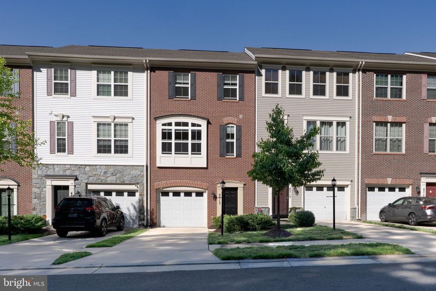 Professional photos will be uploaded on 5/2/2026

Modern 3-level townhome type condo with attached garage—just refreshed from top to bottom and ready for immediate move-in! Ideally located just blocks from Quantico and I-95, this home offers both convenience and comfort.

The attractive brick front, tall ceilings, and abundant windows fill the home with natural light, creating a bright and open feel throughout.   The home features refinished hardwood floors on the main level and  carpet throughout. The kitchen shines with  stainless steel appliances.

The entry level offers a spacious recreation room or secondary living area, complete with a half bath and access to the backyard—perfect for guests or a home office setup. The main (primary) level boasts an updated kitchen with a center island, a generous dining area, and access to the deck, along with a light-filled living space and a convenient powder room.

Upstairs, you’ll find three bedrooms and two full bathrooms. The primary suite includes a walk-in closet, dual-sink vanity, and a tub/shower combination. The additional bedrooms share a well-appointed full bath.

Condo fees include water/sewer, trash and recycling, lawn maintenance, and snow removal for easy, low-maintenance living. Community amenities feature an outdoor pool, playground, and walking paths.

A move-in ready home in a prime location—don’t miss this opportunity!