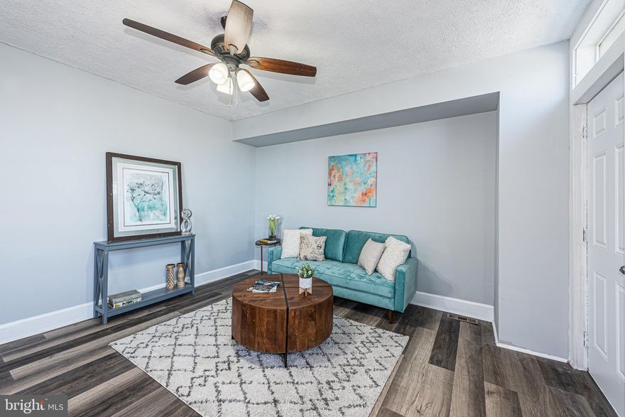 EXCELLENT VALUE FOR THIS DETACHED RENOVATED HOME!  Features include wood flooring throughout, a spacious living room, separate dining room, kitchen with ss appliances, main level full bath, upper level with 2 large bedrooms, a full basement that's perfect for storage and a large deck overlooking the rear yard.  Conveniently located close to major roadways.  Pack your bags and move right in!