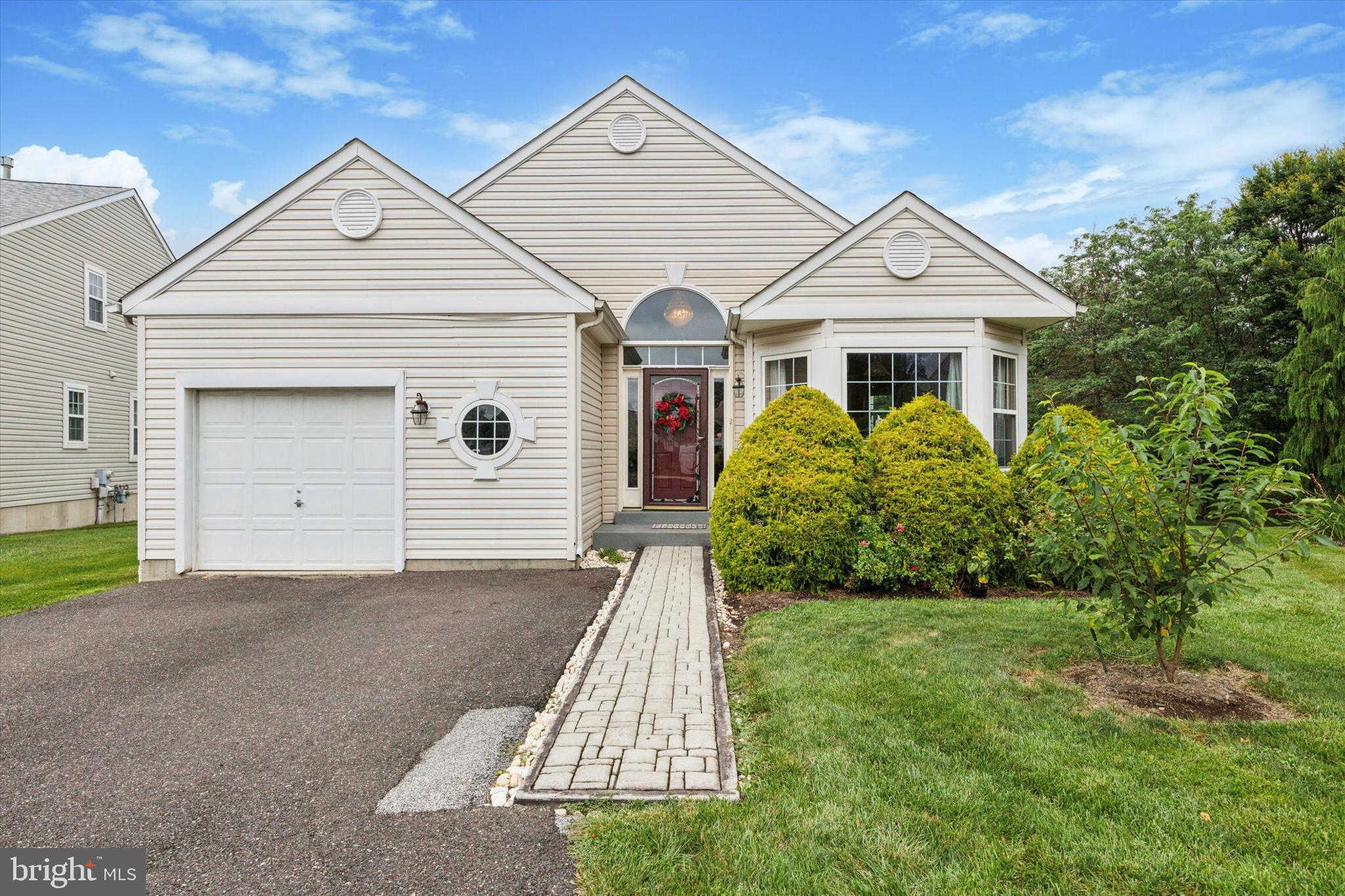 Welcome to your new home in Royersford! This 3 bedroom, 2 bathroom Ranch home sits in a quiet cul-de-sac and provides 1-level living to its next owner with the added benefit of a lofted area for an additional bedroom or versatile space! As you enter, you'll be immediately drawn in by the bright open living space with hardwood flooring and multiple areas of vaulted ceiling. The layout is a bit atypical with the eat-in kitchen just off the foyer entry at the front of the home. Features include white shaker cabinetry, stainless appliances, desk area, and room for a table in the sunny breakfast area. Head through the dining area with chandelier lighting to the living room with vaulted ceiling, 2 ceiling fans, fireplace, and access to the deck. Also on this main level is the owner's suite, complete with walk-in closet and ensuite bathroom that includes dual sink vanity, stall shower, and walk-in seated tub. The main level also includes the second bedroom, second full bath with tub shower, and laundry room. In the loft space, there's an extra large bedroom or the space to use as suits your needs! Outside, don't miss the deck space and plentiful yard to enjoy. 1-car garage and driveway parking. Plus, low monthly HOA fees cover lawn maintenance and snow removal giving you less hassle as a homeowner! Be sure to add this beautiful home to your must-see list if you are home shopping in the area!