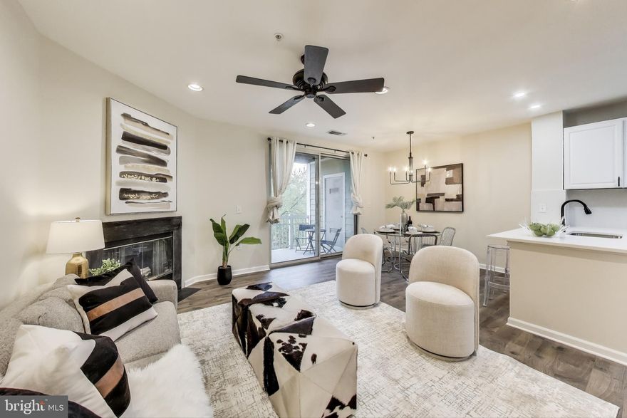 Welcome to 2107 Highcourt Lane #304 — a stylish 2-bedroom, 2-bathroom condo offering the perfect blend of smart updates, thoughtful design, and unbeatable functionality. Spanning two floors and 1,140 square feet, this residence lives large with two private outdoor spaces, an open and airy layout, and countless modern upgrades completed in 2025.

Step inside to a welcoming main level featuring an updated kitchen with brand new countertops, a built-in microwave, and a generously sized pantry for all your storage needs. The open floor plan flows effortlessly to the cozy living space, anchored by a fireplace, and out to your first private patio — perfect for morning coffee or evening gatherings.

 Upstairs, you'll find all-new flooring throughout the entire floor (2025), giving the space a fresh, cohesive feel. The layout is smart and functional, with four doors off the main hallway: a laundry closet with a stacked washer/dryer, a hall-accessible bathroom, and two spacious bedrooms.  

The primary suite is a true retreat, featuring its own private patio and an en suite bathroom thoughtfully updated with dual sinks, dual mirrors, and upgraded lighting — creating a sleek and functional space to start and end your day. The second bedroom is light-filled with large windows, a generous walk-in closet, and direct access to the second full bathroom, which has also been refreshed with a new sink and modern lighting to match the home’s cohesive, updated design.

Major systems have been taken care of too — with a brand-new HVAC and water heater (2024), this home is truly move-in ready. Whether you’re looking for easy everyday living or a sleek space to entertain, this home has it all.

Perfectly situated in Herndon with access to shopping, dining, commuter routes, and more — this is your opportunity to enjoy the comfort and convenience of a fully updated home in a prime location.