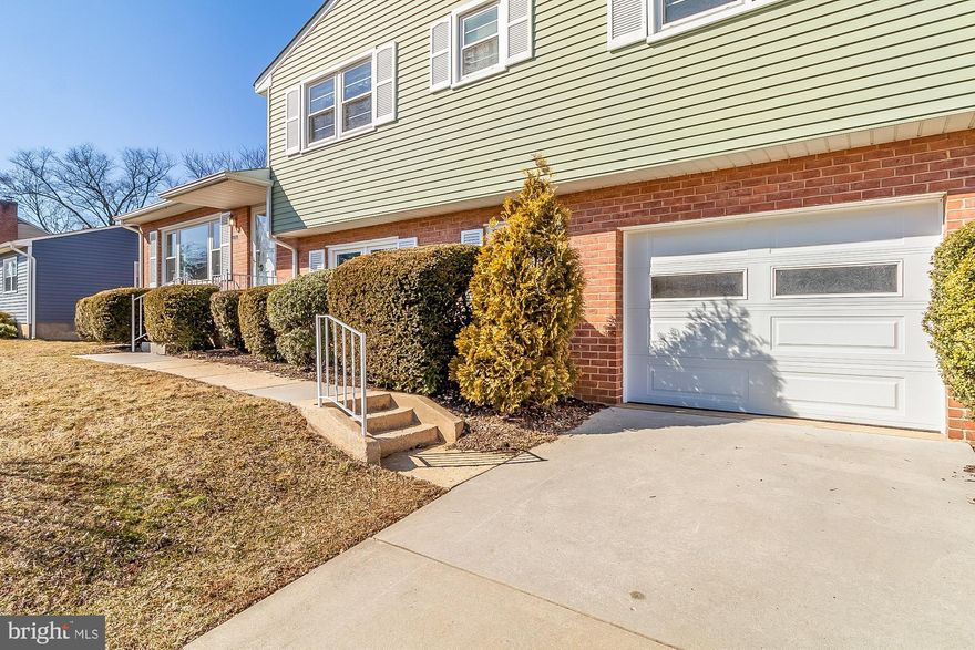 Large 4 bedroom, 2.5 bath split level in Village Green! This home has been lovingly maintained by a long term owner. Kitchen has been recently renovated with white cabinets and granite counters. Windows and slider have been replaced. Hardwood in Living Room, Dining Room, Bedrooms and Stairs. Lower Level Family Room has been freshly painted, new carpet, wood burning fireplace and sliders to back yard. Half Bath in Lower Level with Laundry Room and Entrance to a One Car Garage.  This is a very spacious home in a great neighborhood! Estate Sale.