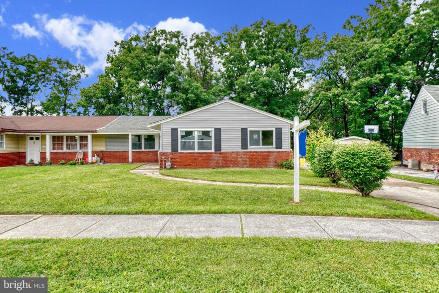 Ready to move in...Semi-detached  with a large driveway and huge backyard. Newer roof, newer HVAC, and newer kitchen appliances. There are nice sized bedrooms with a choice of 3 or 4 bedrooms and 2 full bathrooms.  Don't miss out and come check it out!