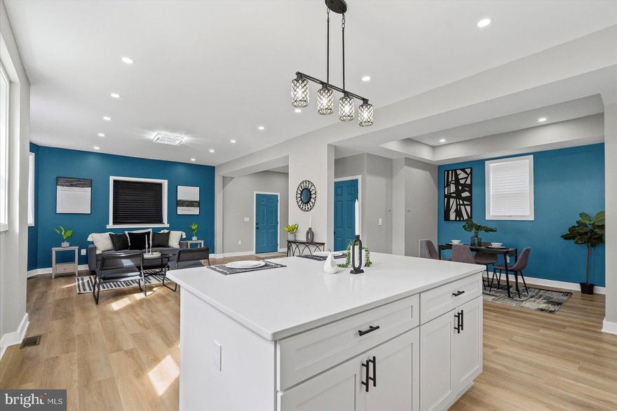 Stunning Newly Renovated 5BR/4.5BA Colonial in Forest Park! This beautifully renovated single-family home offers the perfect blend of modern comfort and classic charm. Featuring five spacious bedrooms and four and a half updated bathrooms, this home is fully renovations with new plumbing, electrical, HVAC, flooring, and exquisite finishes.

The main level welcomes you with an open-concept layout, recessed lighting, stylish updated fixtures, and a cozy electric fireplace. The bright and sunny kitchen is a chef’s dream, complete with stainless steel appliances, sleek cabinetry, and a convenient breakfast bar—ideal for entertaining.

Downstairs, the fully finished basement includes washer/dryer hookups and a full bath, offering flexible space for a rec room, guest suite, or home office.

The first upper level features three bedrooms, including a luxurious master suite with a private deck, plus a hall bath with custom tile. The top level offers two additional bedrooms and another full bath, perfect for extended family or guests.

Don’t miss this rare opportunity to own a fully upgraded home with thoughtful details throughout—all in a convenient neighborhood in Baltimore!