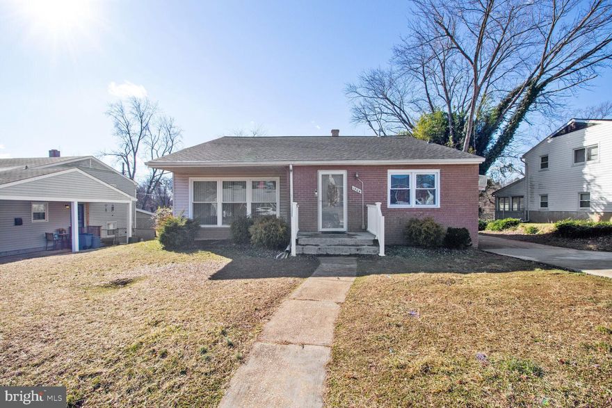 Welcome to 1304 Idylwood Rd, a captivating residence nestled in the heart of the Gwynnvale community in Pikesville, MD. This split foyer home spans three levels, offering three bedrooms and three full bathrooms. Step into an inviting interior adorned with hardwood flooring and an open kitchen concept. The kitchen, complete with stainless steel appliances, granite counters, and recessed lighting, is a chef's dream. Natural light floods the living room, highlighting the timeless elegance of the hardwood floors. The backyard beckons with a spacious paved patio, perfect for entertaining or serene moments outdoors. A brand-new roof, only 5 months old, and updated bathrooms add to the appeal. Enjoy the convenience of an extended 3-car driveway. Situated less than 5 minutes from dining, shopping, and grocery stores, and with a park just 100 yards away, this home offers a perfect blend of comfort and accessibility. Your dream home awaits at 1304 Idylwood Rd, where modern living meets timeless charm.