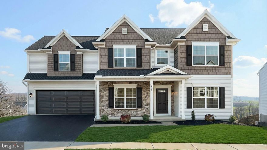 This beautiful home with a welcoming front porch includes a 2-car garage with a large mudroom entry. The first floor and daylight basement boast 9’ ceilings and stylish vinyl plank flooring in the main living areas. To the front of the home is a convenient, carpeted flex room that can be used as a study, living room, or other versatile space. The kitchen is well-appointed with quartz countertops, a tile backsplash, stainless-steel appliances, and a large pantry. The sunny dining area provides access to a rear deck. Open to the kitchen, the comfortable family room is warmed by a gas fireplace with a stone surround and box beam mantel. The 2nd floor owner’s suite features an expansive closet and a private bathroom with a 5’ shower and double bowl vanity. Adjacent to the suite are 3 additional bedrooms, a full bathroom, a spacious rec room, and a convenient laundry room.