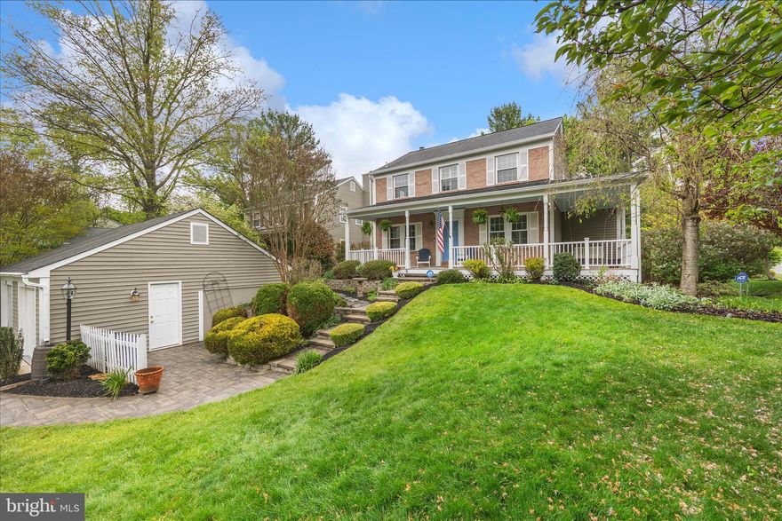 Welcome to 12135 Little Patuxent Parkway, perfectly set on a beautifully landscaped lot just under 1/3 acre in the heart of Columbia. From the moment you arrive, the wraparound front porch and mature landscaping create a warm, inviting first impression, while the detached garage adds both convenience and charm.

Inside, hardwood floors carry throughout the main level.  The welcoming foyer is complete with a built-in storage system to keep everyday living organized. A conveniently located powder room sits just off the entry. The spacious living room features custom built-in bookshelves and a wood-burning fireplace that anchors the space with character.  

The kitchen is beautifully designed, offering a center island, built-in pantry, stainless appliances, granite counters and seamless connection to an additional dining area (or additionalliving area), and adjacent to the formal dining room.   Step out onto the expansive deck overlooking the beautifully landscaped backyard, complete with a zoned sprinkler system.  All of the main level rooms have custom plantation shutters.  

Upstairs, you’ll find three generously sized bedrooms, a large primary suite with dual closets including a walk-in closet and a private bath featuring a dual sink vanity. The hall bathroom is equally spacious with double sinks, and all bathrooms throughout the home have been thoughtfully updated with quality finishes.

The finished lower level adds even more versatility with a large recreation room, a fourth bedroom, an adjacent full bathroom, along with a large laundry/utility/storage area.   The rec room walks out to a paver patio that extends beneath the deck, creating a shaded outdoor retreat. An additional storage room, accessed from the patio, provides even more space for your storage, tools, seasonal items, and more!

This home offers plenty of space, and has an inviting layout, all in a prime location with easy access to shopping, dining, and major commuter routes to Fort Meade, D.C., Baltimore, and Annapolis.