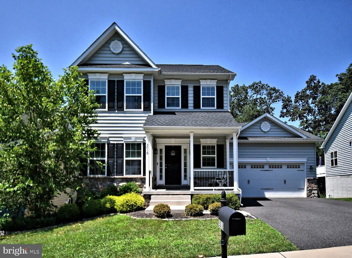 Welcome to our beautifully maintained 3 bedroom 2.1 bath colonial that is in absolute move in condition. This home shows better than a model, you will not be disappointed! Located on a cul de sac street in the Northgate community backing up to wooded open space. Perhaps the best street and lot in the community. As you pull up to the home you will fall in love with the curb appeal. Enter off the covered front porch into the open floor plan offering tons of natural light. Very bright home. Main level offers laminate hardwood floors throughout, neutral paint, ½ bath, office/study space, great room with gas fireplace, beautiful white kitchen with leathered granite counter tops including on the large island, 42 “ cabinets. Off kitchen is the mud room, laundry, access to the 2 car garage and composite deck overlooking the private backyard. 2nd floor with 3 good size bedrooms, main bedroom with full bath room, walk in closet & hall bathroom. Lower level offers a finished walkout basement with lots of extra living space & storage and sliders out to the back yard and fire pit. Newer home built in 2020, propane gas heat and cooking, 2 car garage and good driveway parking , CA, upgraded vinyl siding, fenced in backyard, lots of recessed lights. This home has it all. Wonderful Opportunity