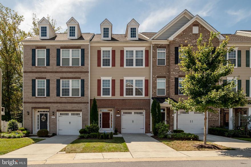 IS IT POSSIBLE???? For an Existing Home to SHOW Better than a Brand New Model??? Emphatically...My Answer is YES!!! This Immaculate Town Home is a ****MUST SEE**** and you will experience for yourself the evident signs of what "PRIDE" of Ownership means. Upon walking into the Main Level , feel the warmth of the Upgraded LVP Flooring which leads to a possible Fourth Bedroom or Rec. Area with a Full Bath. Walk out through the Sliders and step onto the Lower Level Composite Deck  which definitely increases your Outdoor Entertainment Options while viewing the trees and woods. However, before going to the Main Level...Take a peek at the Finished Garage Space...Yes...even the Garage is a showpiece. Now travel upstairs to the Main Level...Yes...I know you will Pause to take in the Overall Beauty & Layout of The Gourmet Kitchen , Crown Molding, Chair Rails, Wainscoting, Accent Stone Wall encompassing the Gas Fireplace;  all of these features emit that Higher Level of Elegance you experience in Custom Homes. Now venture out unto the Oversized Composite Deck with peaceful views of Trees & Woods, and envision the Quality time & Entertaining you will enjoy there.  Wait...did you notice the Upgraded Steel & Glass Patio Doors...NO WORRIES about Future Maintenance Issues. I'm certain at this point you are saying WOW!!!..But there's more!!! Upstairs on the 3rd Level...Peaceful & Comfortable Sleep & Downtime awaits you in the  generously sized Primary Bedroom with Shiplap Accent Wall and Primary Bath with a Soaking Tub...Once again ,the level of Customization is also exhibited in the 2nd Bedroom with its Accent Shiplap Wall. Of course you have your 3rd Bedroom which can also serve as an Office. The Whole Interior was freshly  painted about a Year ago. This HOME is truly Turnkey.  Needless to say all the Community Amenities Offered by Parkside such as : Walking Trails ,New Community Center with Fitness Center, Game area, Pools & Amphitheater adds the Cherry On Top. Centrally located to all Shopping & Entertainment Venues in the DMV.

WELCOME TO YOUR NEW HOME!!!! 

When you come to view this BEAUTIFUL Home, We Respectfully ask you to REMOVE Shoes or WEAR Provided Booties. Thank You