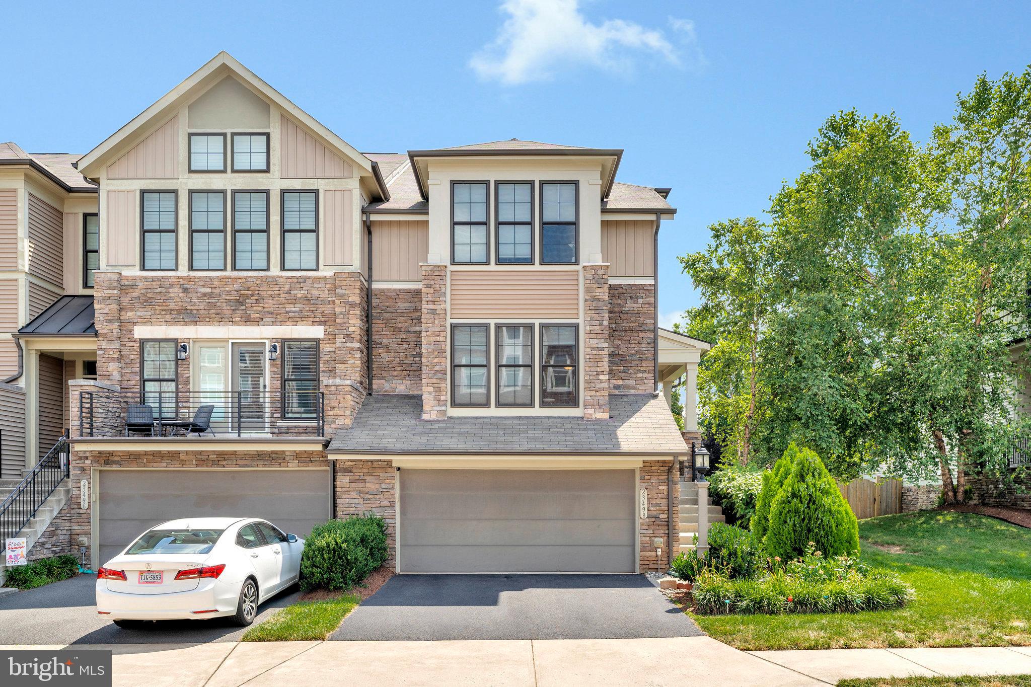 This stunning 3-bedroom, 3.5-bathroom Miller & Smith end-unit townhome with a 2-car garage is a rare find, ideally situated on a premium lot backing directly to Trent Grove Park and Play Area, offering unobstructed views and direct access to open green space. A true walk-out lower level—an uncommon and valuable upgrade—distinguishes this home from similar properties. The upper level features a spacious and well-designed layout with a luxurious primary suite, two additional bedrooms, a versatile loft that can easily function as a fourth bedroom, two full bathrooms, and a convenient laundry room. The main level is enhanced by wide-plank hardwood floors and cellular shades, creating a warm and elegant ambiance. The inviting family room with a cozy fireplace flows seamlessly into a flexible space that can serve as a dining room or home office, a stylish powder room, and an expansive screened-in porch. The gourmet kitchen is a showstopper, complete with floor-to-ceiling upgraded cabinetry, stainless steel appliances, and a generous center island—perfect for both entertaining and everyday living. The fully finished walk-out lower level adds even more space, offering a large recreation room, a custom media room that also serves as a fifth bedroom, and a full bathroom. Step outside to an extra-wide fenced backyard featuring a beautiful stone patio, ideal for relaxing or hosting gatherings in privacy. This is a rare opportunity to rent an upgraded home in one of the community’s most desirable locations. The entire home will be freshly painted in neutral tones and professionally cleaned once the current occupants vacate. No pets please. Available starting August 16, 2025.