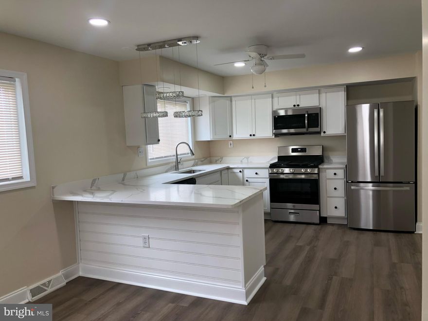 Welcome to this stunning 4 bedroom, 1.5  bathroom home located just 15 minutes away from Fells Point in Baltimore County. Situated in a tranquil neighborhood, this property offers a perfect blend of comfort, style, and convenience. As you step inside, you'll immediately notice the open floor plan, creating a seamless flow between the living, dining, and kitchen areas. The spacious layout is perfect for both relaxing with family and entertaining guests. Natural light floods the interior, accentuating the warm ambiance throughout. The well-appointed kitchen is a dream, featuring modern appliances, ample cabinet space, and a breakfast bar for quick meals on the go. It's ideal space for creating lasting memories. The home boasts four bedrooms, providing plenty of space for a growing family or accommodating guests. One of the standout features of this property is the detached garage and long driveway, providing ample parking space for multiple vehicles. Outside offers plenty of room for activities or gatherings with friends and family. Located in a quiet neighborhood, you'll enjoy the benefits of a peaceful atmosphere while still being just a short drive from Fells Point. Explore the area's renowned dinning, shopping, and entertainment options. Don't miss out on this opportunity to make this beautiful home yours. Schedule a showing today and experience the best of Baltimore County living and say yes to the address!