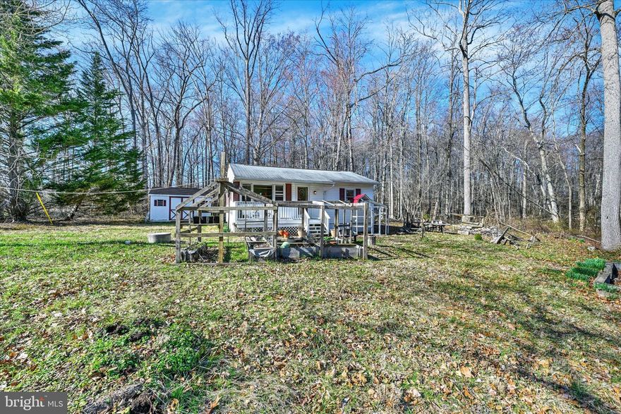 Tucked away in a quiet Bel Air neighborhood, 2108 Moorland Dr offers the perfect blend of peaceful nature and everyday convenience. This charming 2-bedroom, 1 full bath cottage features a bright combination living and dining room, along with a separate kitchen that offers great functionality and charm. Closets are cedar-lined offering added peace of mind. 

Step outside and experience a truly special setting—complete with a pond, stream, and thriving wildlife habitat where you’ll enjoy visits from birds and woodland critters. The rustic firepit area creates the perfect spot for relaxing evenings under the stars, and berry bushes on the property add to the home’s natural appeal. In the summer months, the yard comes alive with glowing fireflies, creating a magical outdoor atmosphere.

Nature lovers will appreciate that the Walls Cook Trail, a hiking and mountain biking trail, runs just behind the home—offering easy access to outdoor adventure right from your backyard. Conveniently located near Harford Community College and downtown Bel Air, you’ll enjoy quick access to shopping, dining, and amenities while feeling like you’re camping in the woods.

A rare opportunity to own a peaceful retreat in an ideal location—schedule your showing today!