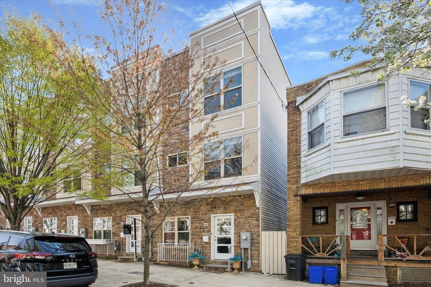 Located on the quieter side of Manayunk in Wissahickon, this nearly-new 3-bedroom, 3.5-bath home offers every conceivable modern amenity and four spacious floors of living space, blending city convenience with natural surroundings—plus 2 years remaining on a 10-year tax abatement.

Built in 2017, the home features a wide open-concept layout, high ceilings, and large windows that fill the space with natural light. The living room is centered around a sleek gas fireplace, creating a warm and inviting atmosphere. The open floor plan easily accommodates a full-size dining area, perfect for entertaining during holidays or large gatherings.

The kitchen is outfitted with stainless steel appliances, quartz countertops, an island, custom tile backsplash, and bold geometric light fixtures. A private deck off the kitchen—with a natural gas hookup for your barbecue—extends your living space outdoors.

Upstairs, the second floor includes two large bedrooms—both with oversized closets—a full bathroom with a full-sized tub, custom tile work, chic vanity, and contemporary lighting. For convenience, an upstairs,  well-equipped laundry room featuring quartz countertops and classic shaker cabinetry.

The entire top floor is dedicated to a luxurious primary suite. It features custom built-in closets—including a walk-in—with integrated shelving and drawers for streamlined organization. The spa-like bath steals the show, with a deep soaking tub set in front of a picture window offering bird’s-eye views of blooming mature trees, a custom tile shower, double vanity, and a private water closet.

The roof deck offers sweeping views of Center City and Wissahickon Park and includes a built-in spigot—ideal for a rooftop garden or outdoor play. The finished basement features high ceilings, walk-out access to the development's courtyard parking, and flexible living space for a gym, media room, or play space.

A gorgeous custom glass railing system spans from the main level to the rooftop, accentuating the home's sleek design and open, airy aesthetic. With a one-car garage featuring interior access and an additional driveway space, coming home is a dream. Dual-zone central air ensures customizable comfort and energy efficiency, and the home also features a whole-house sprinkler and fire suppression system.

Just a short walk to Wissahickon Station (with a 20-minute ride to Center City), this home is perfectly positioned for both convenience and outdoor adventure. Explore miles of hiking and biking trails in Wissahickon Park or along the scenic Schuylkill River Trail. With effortless access to Wissahickon Creek and the Schuylkill River, you might even find yourself joining the historic Wissahickon Canoe Club at the bottom of the hill. La Noce Park and Playground is just one block away, perfect for kids and outdoor play. Commuting is a breeze with quick access to Kelly Drive and I-76. All of this, plus the shops, dining, and charm of Main Street Manayunk—with the peace and tranquility of the Wissahickon Valley in your backyard.

Schedule a showing today!