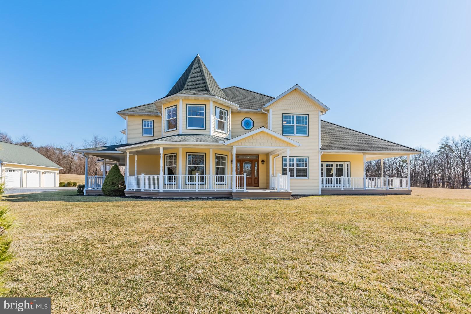 PLEASE DO NOT DRIVE UP DRIVEWAY WITHOUT A SCHEDULED SHOWING. Welcome to the serene setting of this Victorian style home situated on just under 8 acres in CV Schools. The tree-lined driveway and meadow like front yard, set the stage for this custom built meticulous home. The outdoor space is enhanced by an inground concrete salt water pool and spa w/ many new features, complimented by a pool house, equipped w/ a kitchenette. There is a 1200sq. ft. 3-car detached garage w/ room for a car lift, plumbed for a bathroom and above floored storage. The driveway in front between the 2 garages is heated! There is also a 3-car attached heated oversized garage, w/ epoxy floor finish, radiant heated floors and floor drains. The home has custom features that have been meticulously thought out by the current owners. The grand circular staircase in the foyer, welcomes you to this home, w/ a home office, featuring hardwood flooring and natural light. The kitchen and breakfast area have soaring windows, custom cabinetry, island w/ Viking 6 burner gas range and retractable exhaust fan, large walk-in pantry and subzero refrigerator. Great room w/ 20ft. (+) ceilings, a wood burning FP and numerous windows. 1st floor primary BR has 2 walk-in closets, tray ceiling w/ enhanced lighting and french doors leading to the wrap around porch. Conveniently there is a mud room/laundry room off of the primary bathroom, as well as a 2nd laundry area on the 2nd floor, complete with a sink. The 3 BR's on the 2nd floor have walk-in closets, 2 have adorable window seats and plenty of natural light! There is a bonus room that has many uses, office, workout room or another bedroom. The basement is beautifully finished w/ everything you will need! A media/theatre room, a home gym, full bath, game room w/ gas fireplace, safe room and workshop. All floors on the main level of this home are heated w/ separate controls, there are 2 propane boilers, 3 zones of AC, 1 on each floor, a 50 yr roof, complete water filtration system and a covered back porch overlooking the pool. There are 2 parcels, deeded separately, included with this sales price, 7.07 acres and .91 of an acre. Just an incredible property with so much privacy, but yet great for entertaining!