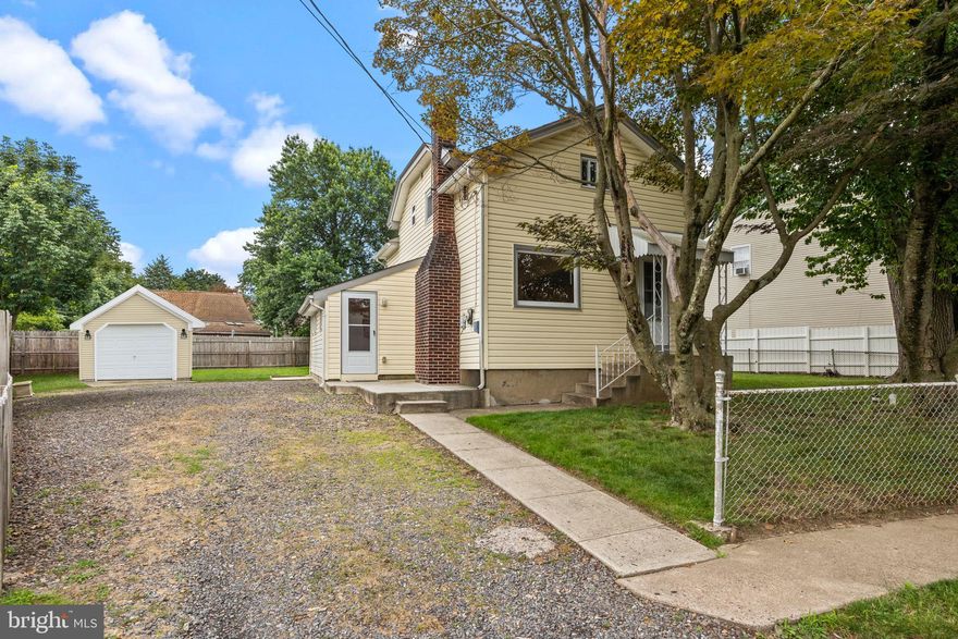 Welcome to 222 Neshaminy Rd! This move-in-ready 3-bedroom, 1-bath single home located in Croydon Manor offers comfort, space, and convenience. Step inside to find it has been freshly painted, brand-new carpeting, and a spacious living room featuring a large picture window and charming decorative fireplace. The updated kitchen offers ample cabinet space, granite countertops,  an island with bar seating, stainless steel appliances, and recessed lighting—perfect for everyday cooking or entertaining. A generous dining area with laminate flooring provides plenty of room for gatherings, and just a few steps down, you'll find a cozy family room for extra living space. Upstairs, all three bedrooms offer walk-in closets, while the beautifully remodeled bathroom showcases custom tilework and a tub/shower combo. The full basement includes laundry area,  storage, and convenient walk-out access. Outside, enjoy a large, spacious yard with a garden area and an Amish-built detached garage complete with electric—ideal for storage, a workshop, or hobby space. A spacious driveway provides ample parking. This home truly has it all—schedule your showing!