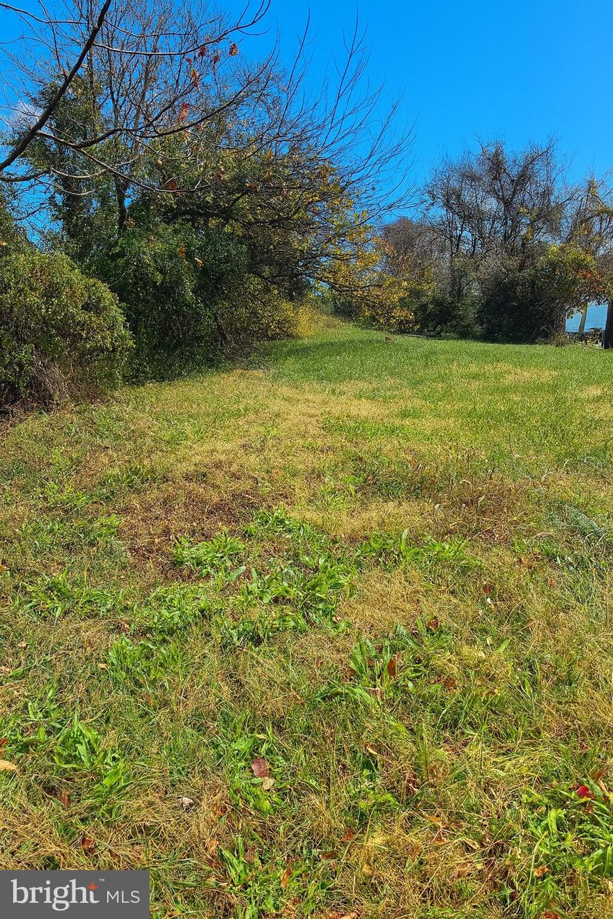 Wonderful lot ready for your home plans! Close to water, shopping, major roads and more. Buyer to verify zoning, feasibility, and existence of utility hookups. Bring your design and live the good life.