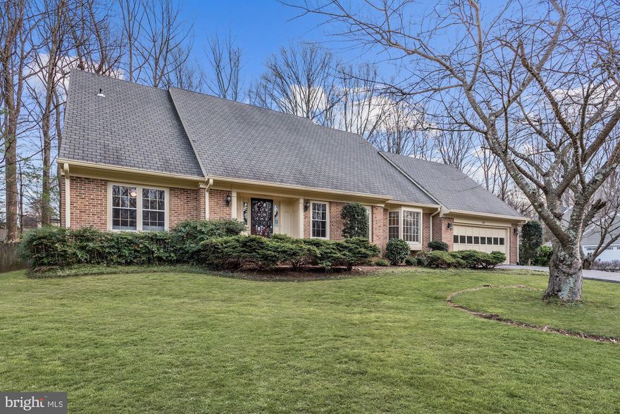 Mint condition, turn key colonial in sought after Langley Oaks with 5800 sf on three levels including a main level Master Suite and four additional bedrooms on the upper level * Sited on a beautiful lot just a block to walking trails into  hundreds of acres of parkland * Pride of ownership shows throughout * Large open kitchen with breakfast nook with  scenic views, an  adjoining family room with fireplace and an adjoining sun room drenched in sunlight * The floor plan is excellent for entertaining large groups with circular flow or smaller  intimate groups around the kitchen island * The expansive lower level features an expansive rec room with a bar and a full bath, den and exercise room.  Just minutes to 495 and the GW Parkway.