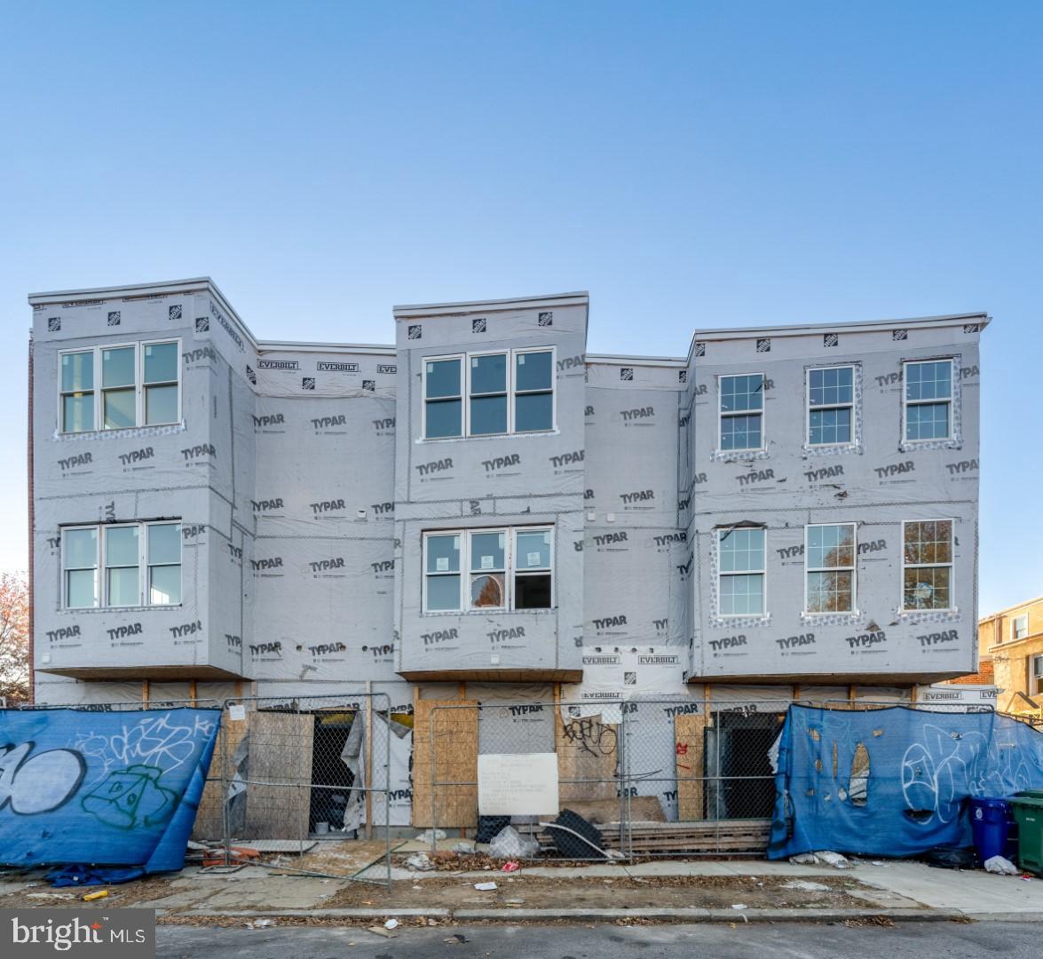 * INVESTOR ALERT * Three-story, newly constructed 3600+ SQFT Quadplex with a unit composition of two ground floor commercial spaces complete with fire-rated drywall and full bathrooms, an 1,160 SQFT 4 Bed / 1 Bath on the second level, and a 1,200 SQFT 4 Bed /1 Bath on the upper level, both with washer/dryer connections. 95% complete and ready for finishes to include appliances, condensers, siding, etc. Significant upside equity for development in the Station North Arts District! Zoned R8. ARV of $920,000. Projected annual gross of $109,000. Building permits, stamped drawings, site plans, MEPs, and appraisal available upon request!