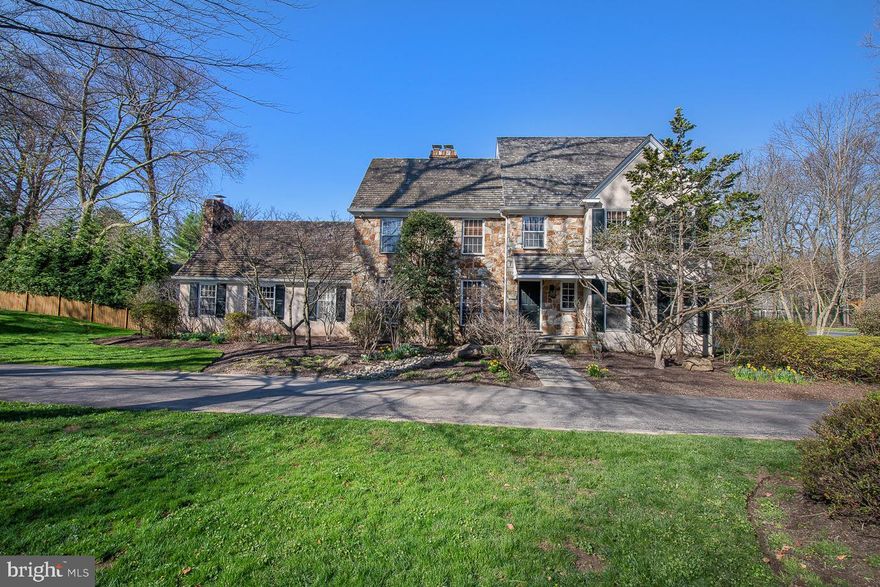 The comforts of home are all yours in this stunning, meticulously maintained Main Line home in coveted Northside Bryn Mawr! The gorgeous grounds are pristinely landscaped and brimming with tall trees and specimen plantings. The backyard is fully-fenced for the safety of kids and pets, and a lovely rear patio affords outdoor entertaining and enjoyment. The backyard is a true oasis set on 1.15 acres with an inviting pool and pool house. The pool house has a bedroom, full bath, living area and kitchenette. Perfect for guests, au-pair living quarters, or an in-law suite. You’ll love the gracious interiors of this  gem that enjoys tons of natural light, hardwood floors, tasteful millwork & woodwork, and generously-sized rooms.  Any cook will adore the hub of the home - the gourmet kitchen appointed with Wolf, Miele and Sub Zero appliances, and an expansive center island with seating for gathering around. Adjoining is an open, light filled family room. The formal living room and dining room each have a wood burning fireplace for cozy living. The master bedroom rounds off this main floor with beautiful views of the backyard and pool. The second level has 3 bedrooms, all ensuite, plus an office. There are three spacious walk-in storage attics in this home. One above the garage, one above a second floor bedroom, and one more unfinished space off of the laundry area. Tons of storage and endless possibilities for refinishing.  Best of all is the prime location near shopping, dining, transportation, and award-winning Lower Merion schools!