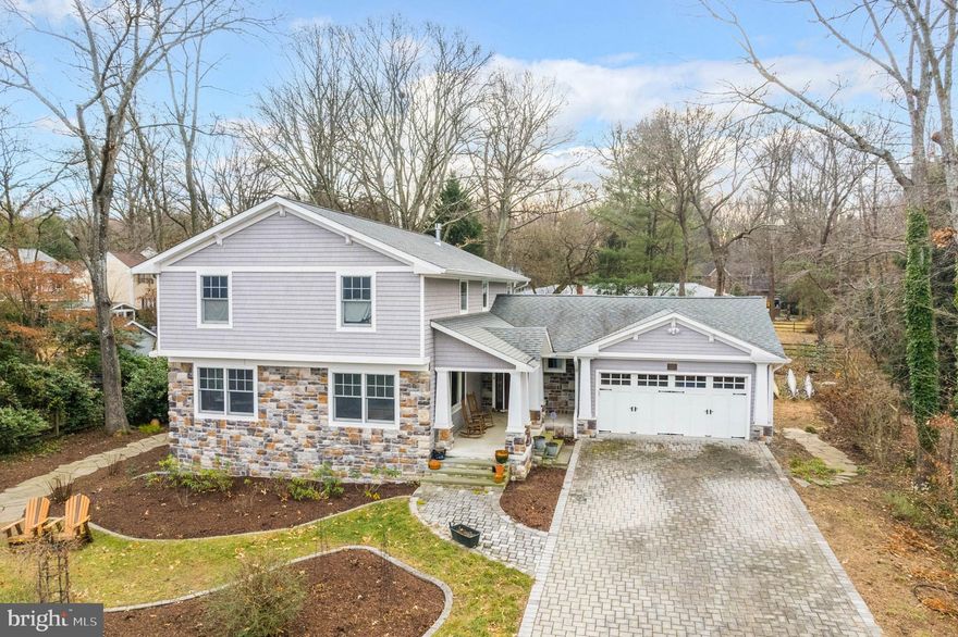 Unpack and start enjoying your 5-bedroom, 2.5-bathroom, 3400 SF custom craftsman home on a private .47 acre lot in Bayberry on the Magothy. A short walk takes you to the community beach and marina on the Magothy River. The front porch opens into a bright foyer leading to a renovated home with oversized windows, custom trim, and hardwood floors. The main level features a renovated kitchen, great room with dining area, gas fireplace, and sunroom overlooking a private backyard with perennial blooms and a paver patio with a stone fire pit. There's also a bedroom, living room, laundry room, powder room, and dining room or office. The upper level has a spacious primary bedroom with a walk-in closet and renovated en suite bathroom, plus three more bedrooms and an updated bathroom. The lower level offers a dry unfinished basement for storage. The large yard with perennial planters is perfect for swing sets and soccer nets.  A short walk to your community  beach and boat slips on the Magothy River,  gather with friends at the beach or spend the day on the Chesapeake Bay.  Your new home is just minutes from downtown Annapolis and an easy commute to DC and Baltimore.   Children are well served at  Broadneck blue ribbon public schools.   Come on home and get ready to spend your next 30 years making wonderful friends and warm memories  in Bayberry on the Magothy,   Improvements include: