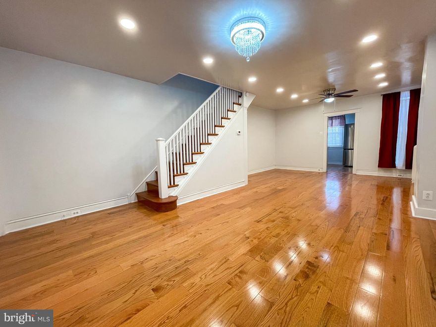 Welcome to this picture perfect, fully renovated home in 100% move-in condition! This gorgeous home has a wide-open floor plan with brand-new hardwood flooring throughout. The brand new kitchen offers lots of counter space, beautiful cabinets, elegant quartz countertops, and all new stainless steel appliances, including a new gas range and side-by-side refrigerator. Upstairs, you’ll find a big master bedroom with great closet space, along with a beautiful new bathroom with marble-tiled walls, vanity and a sleek glass tub enclosure. Two more nice sized bedrooms all featuring the same stunning hardwood floors. The finished basement provides additional living space and includes a laundry area with a brand-new washer and dryer. Outside, enjoy off-street parking, a one-car garage, and a deep rear yard with new concrete — perfect for entertaining or relaxing. The home sits on a nice quiet, block and features a large fenced-in front patio and a well-maintained front lawn. Immediate possession available. Don’t miss this incredible opportunity to own a truly stunning, beautifully renovated home with nothing left to do but move in. See you at settlement!