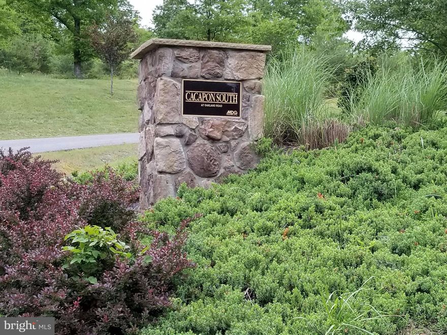 Nice wooded building lot in a great community.  Features close access to county roads US522, Cacapon State Park, and I-70. Most utilities have been developed and are available which makes it very desirable. Would make for a great potential building site for a new home. Well maintained roads are part of the appeal as well.  A must see!