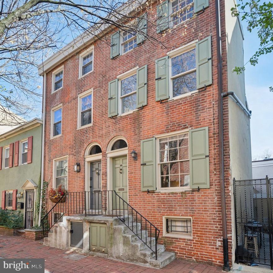 Welcome to 1038 Waverly, a historic early 19th-century trinity townhome nestled on one of Philadelphia’s most picturesque streets.​This charming home seamlessly blends vintage details with modern amenities, featuring two bedrooms, two bathrooms, and approximately 1,000 sq. ft. of comfortable living space​, perfect for a unique urban lifestyle. Throughout the home, you'll find beautifully maintained vintage wood pine floors, exposed beams, and three fireplaces.​  The lower level boasts a ​renovated designer kitchen complete with exposed brick walls, limestone counters, Kraftmaid maple cabinetry, a copper pot rack.  Newer stainless appliances were installed in 2019 including dishwasher, gas convection oven and range, and a stacked ​front loading washer and dryer.​  This level ​also features a storage room and an impressively useful utility room​!  Upstairs, you'll find the main living area with adjacent three piece bath with walk in the shower.  On the second floor you'll find the primary suite which includes an ensuite bath with classic subway tiles and a shower/tub combo. The bright and airy third floor offers a spacious second bedroom/den with exposed beams and access to the flat roof, presenting a fantastic opportunity for a future roof deck. The home with two full baths is a rare find in trinity homes, as well as central air conditioning and gas heat.​  Outside, you'll find a peaceful, private patio, as well as a welcoming front stoop perfect for chatting with neighbors. Situated in the heart of Washington Square West, you'll be moments away from Philadelphia's Magic Gardens, Antique Row, Kahn Park, Whole Foods, ​Giant Foods, and a diverse array of dining options.​  Don't miss the opportunity to make this exceptional property your own. Feel free to schedule an appointment to view it today!