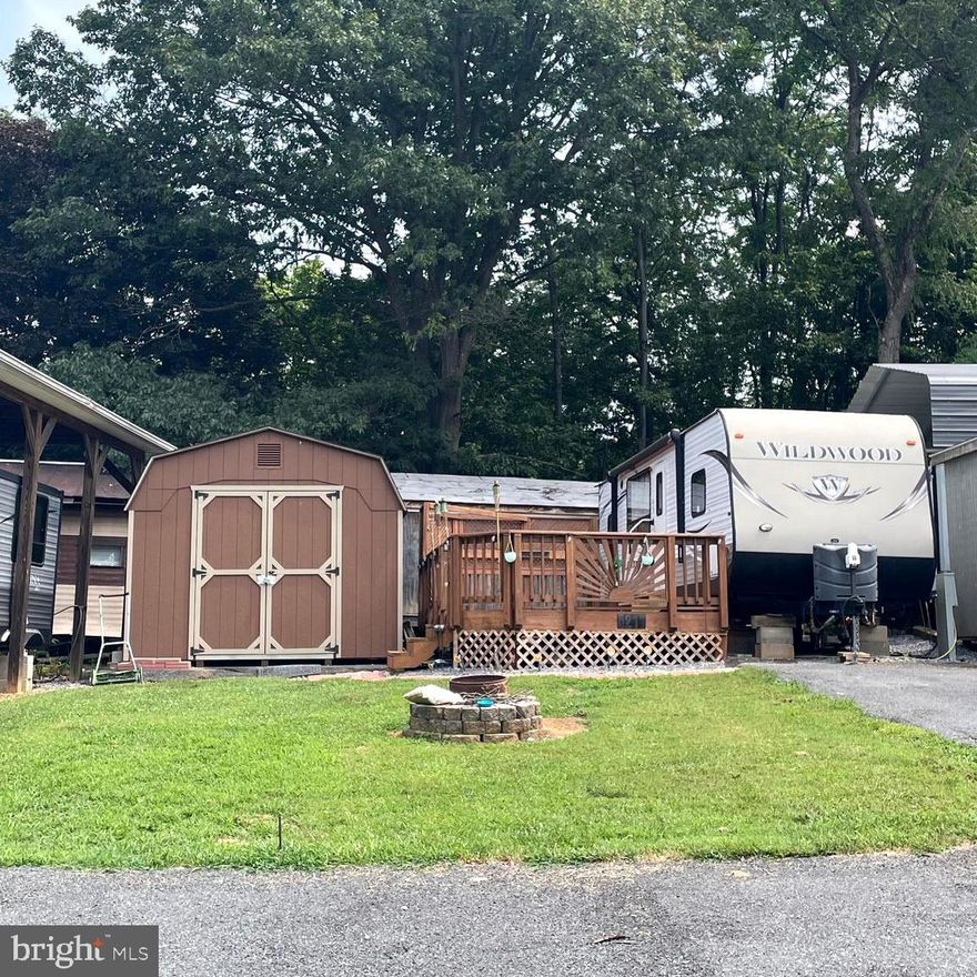 Don't miss viewing this one, nice lot with yard and plenty of area paved for parking, , well cared for and ready to go to enjoy the rest of the summer!  Sale includes, the Camper, with 1 bedroom and full bath, nice kitchen with stainless appliance and oven, so you can still bake those famous dishes.  Open space in the living room, could add recliners or great space for the fur babies, couch can be a bed and the dining room table too.  Deck, shed, firepit.  Lot is on sewer.   Seller will sell the lot and move camper off lot if you have your own camper.   Sales price of 28K.  To view the property, Riverbend Park is a gated community, so you need to enter at the guard shack. Entry is not permitted without ID per the office rules. Bring IDs to the office or guard shack for visitor pass. THIS IS A SEASONAL CAMPGROUND -OPEN FROM APRIL 1 TO NOVEMBER 1. River Bend is a privately owned 400 acres recreational- vehicle camp resort with seasonal activities for members, families and guests. This great RV park is tucked away on the Upper Potomac River of West Virginia; River Bend is one of West Virginia's most popular family seasonal destinations. Just a short drive from the Washington and Baltimore metro area. Open with utilities from April 1 to November 1. (Lot owners have access to their property during the off season). Riverbend Park offers lots of fun and entertainment, or a great place to get away and relax. 10 miles of Deep water on the Potomac River, access for boating, fishing & swimming and other park amenities include 3 swimming pools, mini golf course, Horseshoe club, Boat club, Poker runs, Trick or Treat, Christmas in July, live bands, basketball court, tennis court, fireworks, car show, Church, restaurant, bar, convenience store, playground, volleyball, ball field and much more.