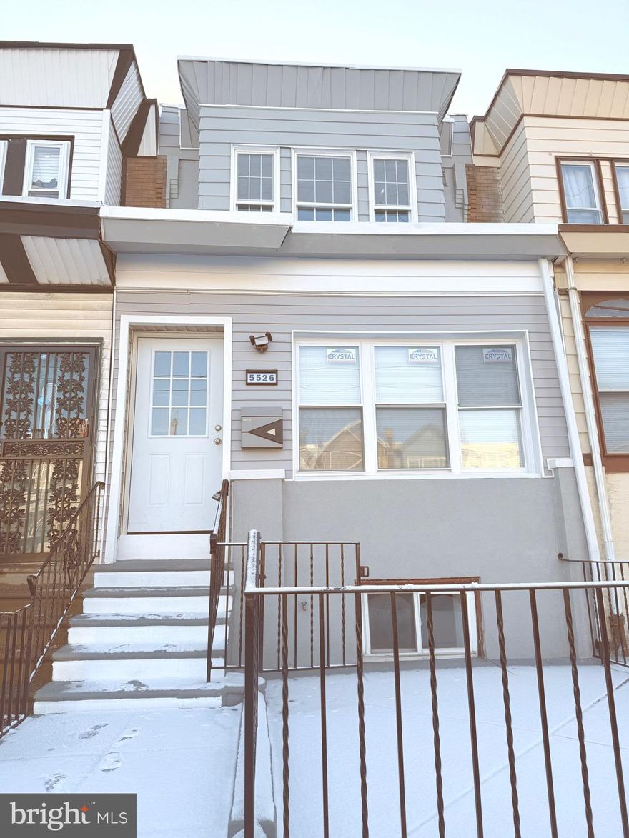 Welcome to 5526 Greenway Ave. This is a beautifully renovated 4 bedroom 2.5 bath. Upon entering, you will walk into an inviting open floor living area with hard wood floors throughout and an electric fireplace along with a powder room for guests. Head into your new kitchen with all brand new stainless steel appliances and a beautiful island great for entertaining. Upstairs you will find 3 nice sized bedrooms and a full bath. In the basement, enjoy another living space with an electric fireplace, full bath, laundry and your fourth bedroom. Great to use as a in law suite or even a man cave. There is also a walk out to the private backyard from the basement. This house has brand new central cooling and heating. Close to public transportation and easy access to Center City! Schedule a showing today!