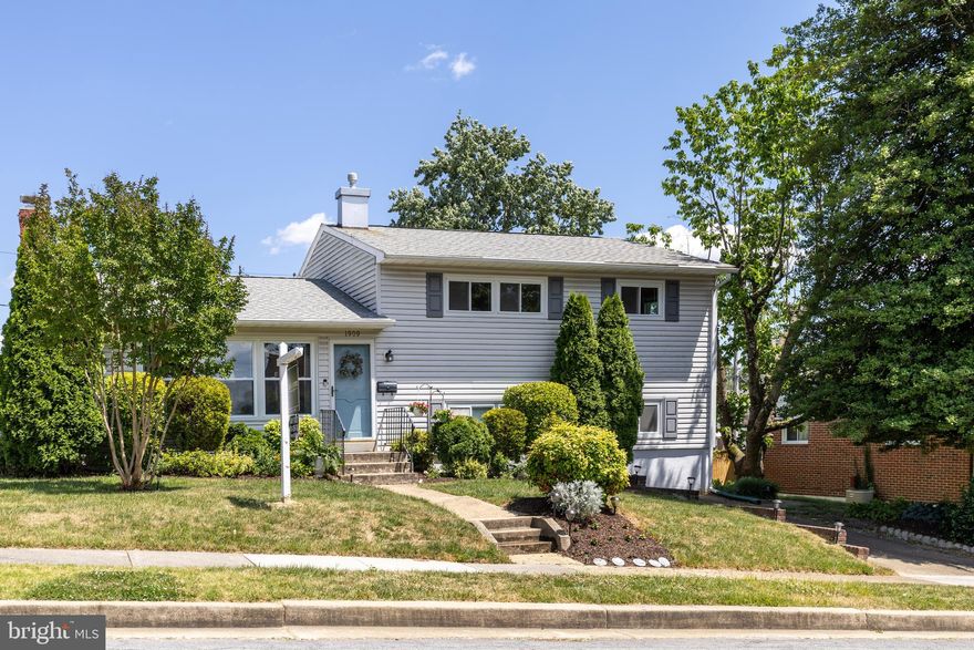 Tucked away in the RARELY AVAILABLE community of ROLLINGWOOD in Catonsville, this spacious FOUR LEVEL split features 4/5 bedrooms, 2.5 bathrooms, & over 2,000 square feet of living space. The large, sunny living room welcomes you with it's original wood floors, expansive front "wall" of  windows & gas fireplace with brick surround. Continue into the dining area (also with hardwoods) then through french doors to the bonus 3-season/ SUNROOM-A fantastic additional space for gathering & entertaining! Eat-in kitchen features sleek quartz counter tops, custom backsplash & classic wood cabinets. Upstairs are 3 bedrooms, all featuring hardwood floors & ceiling fans. There is attic acess  in the hallway w/pull-down stairs & plenty of space for extra storage. The primary suite includes two closets & private bathroom. Two additional bedrooms, two large linen/storage closets, & a 2nd full bathroom complete the upper level. The first lower level reveals a family room, laundry room, powder room & walkout access to the rear patio & yard. There is a 4th bedroom with it's own side entrance, PLUS additional room that makes for an ideal In-Law or au pair situation.  Just outside the family room, a paved patio & beautifully landscaped yard with perrenial gardens & lush lawn, await. The lower-fourth- level provides tons of additional storage & endless potential to create a space that suits your needs, whether it be a SPECTACULAR game room, work-out/gym, children's playroom,  or workshop....(just to name a few!) MAKE IT YOUR OWN!
This stand-out location is just a stone's throw away from popular Rollingwood Swim Club (rollingwoodpool.org  which requires additional membership) & Rollingwood park w/tot-lot & basketball courts. FIVE OAKS pool is nearby as well. For outdoor enthusiasts, the nearby Patapsco State Park Hilton Area provides an opportunity to explore trails, picnic areas, & of course the children's tire park & nature center. Minutes to Westchester Elementary, the Trolley Trail & all that both Catonsville and Ellicott City have to offer. The home's convenient location also makes commuting a breeze with easy access to major Routes 40 and 29, Frederick Road, I-95, I-695 and very close to I-70......to Baltimore, Annapolis, DC, or surrounding areas is straightforward and stress-free.
HURRY!!!