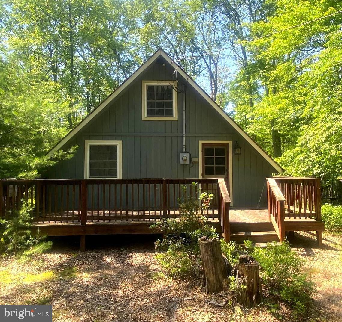 Escape to your private getaway in the mountains of West Virginia! This charming A-frame cabin is nestled on 5 mostly level acres with beautiful rock outcroppings, offering the perfect blend of seclusion and adventure.
Located in the desirable Ritter’s Hidden Valley community, this property gives you access to two lakes—one for fishing and one for swimming—plus over 20 miles of roads and trails open to ATVs. Whether you're into , hiking, fishing, hunting, or simply soaking in the mountain air, this is the ultimate outdoor playground.
The cabin features the classic A-frame design with an open living area, cozy finishes, and large windows that bring the outdoors in. It’s a perfect spot for weekend getaways or even as a short-term rental investment.
The lot is mostly flat and usable. There's no HOA, but the roads, lakes, and community spaces are well-maintained by the RHV Maintenance Corporation for a low annual fee of just $300.
Additional community amenities include a park, picnic areas, and tennis courts—so there's truly something for everyone.
Don’t miss your chance to own a slice of West Virginia heaven. This is the mountain retreat you’ve been dreaming of.