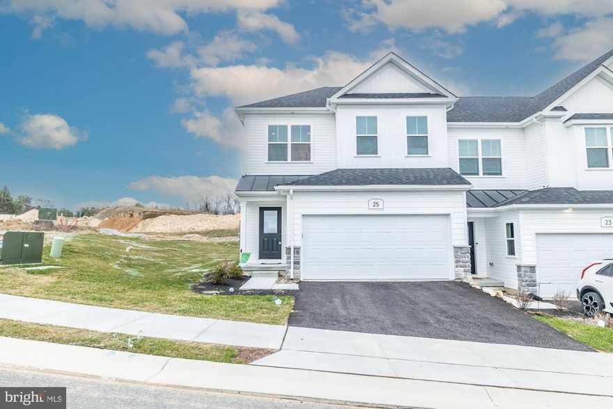 Welcome home! Skip the wait for new construction and step into this beautifully upgraded, barely lived-in end unit. Boasting over $120,000 in premium options, this home is packed with thoughtful upgrades.
Enjoy the warmth of a fireplace, the elegance of open staircases,  the laundry room features an oversized sink with cabinetry.   This home offers 3 bedrooms, 2½ baths, with a future bath already roughed-in in the basement. Walk through the front door, kick off your shoes, and relax—there’s truly nothing to do here!
The gourmet kitchen is everything you’ve been dreaming of, featuring a stunning coffee bar, an oversized island, and a walk-in pantry. A 3-panel door fills the space with natural light, leading to the dining area and open living room—an entertainer’s dream and perfect for everyday living.  Great Lot - Open Space behind and a large open space on the side.