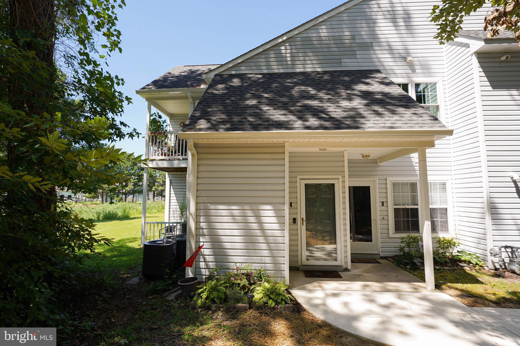 Welcome home to Unit 4 in the 11421 Building of the Meadows at Manklin, the epitome of low-maintenance living located just inside of the South Gate entrance of Ocean Pines. This bright and airy 3 bedroom 2 full bathroom condo unit is just waiting for it's new owners to come and introduce themselves!
With a ground-level entry, you'll walk inside, and then upstairs to an open concept floorplan, an efficient kitchen adorned with stainless steel appliances, bright white cabinetry, granite countertops, and kitchen island with knee wall for additional seating, counter space, and additional cabinetry! While open-concept, updated modern light fixtures help govern use of space, with enough space for formal dining, a living room, and even a built-in pantry to boot! Also located off the main living space is balcony access, perfect for enjoying morning coffee or evening drinks, taking in the saltwater breeze!
Off the living area, you'll find a small bedroom accented with mini-french doors, giving you the potential to extend your living space, or keep a bonus space off the living room. The possibilities are there, you just need to bring your imagination! Off the kitchen, you'll find a hallway leading to a full hall bathroom, an additional bedroom, and last and most certainly not least, a primary suite, adorned with a vaulted ceiling that helps offer that open feel, and an en-suite full bathroom, equipped with full-size stackable front-load LG Direct Drive Front Load washer/dryer combination. Just off the en-suite bathroom you'll find the primary bedroom walk-in closet, recently upgraded with a custom California-closet style organization outfitting.
Located a stones throw from the South Gate entrance to Ocean Pines, this condo is minutes from all that Ocean City MD has to offer, and just moments from Delaware beaches and tax free shopping in Sussex County DE. You'll benefit from the amenity-rich Ocean Pines neighborhood, with endless things to do year round, while being less than 3 hours from major Metropolitan areas like Baltimore, Washington DC, Philadelphia, and Virginia Beach. Come call it home full time, or your home away from home! At least, until this can be home, full time! Call to schedule your private tour today!