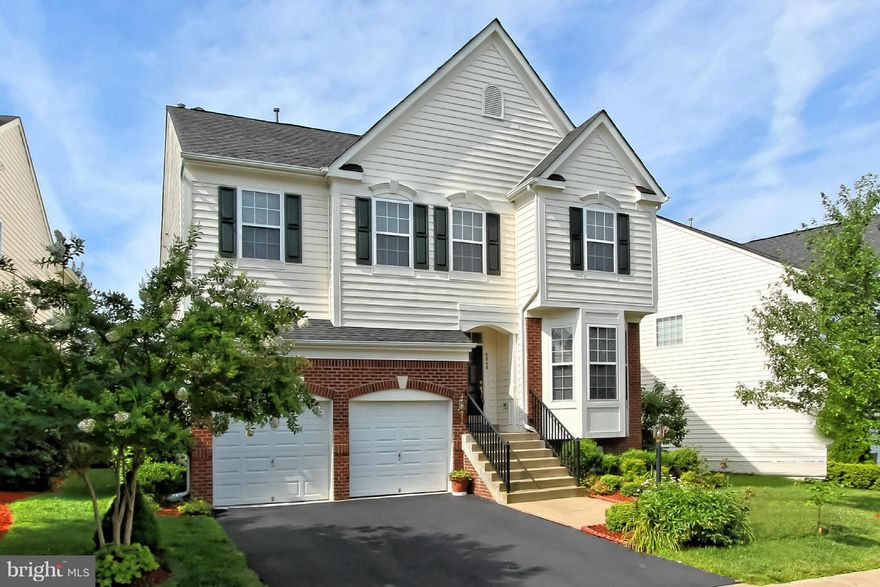 BEAUTIFUL HOME with GRANITE ENTRYWAY and INLAYS THROUGHOUT main and lower lvl. OPEN CONCEPT. GRANITE FP&COUNTERTOPS, ISLAND and UPDATED APPLIANCES in kitchen.  MARBLE FLOORING in mud room. HIGH CEILING in FAMILY and MASTER BEDROOM. WALK-IN CLOSET in MASTER. FULLY FINISHED BASEMENT w/ 2 POTENTIAL BEDROOMS and HUGE WALK-IN CLOSET. RECESSED LIGHTING. 2 CAR GARAGE. CROWN MOLDING. *THIS IS A MUST SEE*