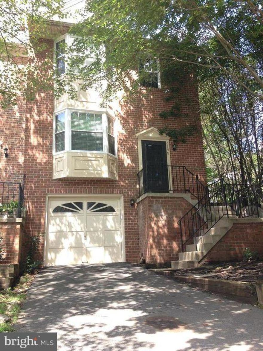 Renovated End Unit Townhouse next to a large common area. Hardwood throughout the main level, sliding door walks out to the refinished 2 story deck. Upper level has 3 bedrooms and 2 full bathrooms and wall to wall carpet. The basement has a half bath, fire place, washer and dryer & walk out can be used as a bedroom. Perfect for Families! OPEN HOUSE 2/17 12-3pm  & 2/18 1-4pm