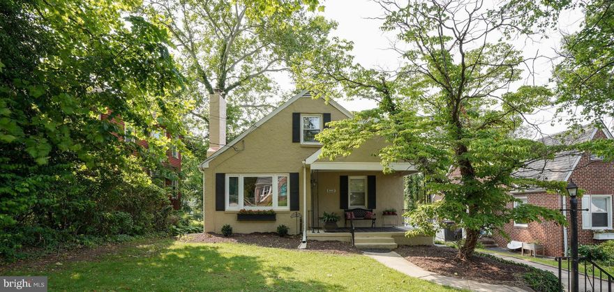 Welcome to this charming 5 bedroom home with many newer features. Some of them include: roof 2020 (leaf guards on gutters), HVAC 2022, water heater 2022, fresh exterior paint & some on interior, & upgraded electrical panel. The kitchen had the following installed in 2025: dishwasher, stove, sink and flooring. Great durable metal backsplash. There is a pass thru from the kitchen to the sunroom that overlooks the backyard. Nice open floor plan from the living room to the dining area & hardwood floors. Wood burning fireplace with extra wood in the backyard. Two bedrooms are on the main level, 2 on the upper level (& walk-in closet) and one in the finished basement. There is also a whole house fan on the upper level. The main level & upper level have full baths. The one on the main level was renovated in 2025. The walkout basement also has a large family room with a large TV, new carpet & vintage knotty pine paneling. Plenty of storage in the laundry area, and also a workbench, & 2 sump pumps. There is also a flush on this level with a rough-in for a shower. The backyard is very inviting with a deck,  sand filled "beach" fire pit area,  6-seater 2-yr-old hot tub, & newer vinyl privacy fence. Note that the square footage in the public records is incorrect because it did not included the sunroom. .6 miles to MARC train & 10 minutes to BWI Airport. Come take a look!